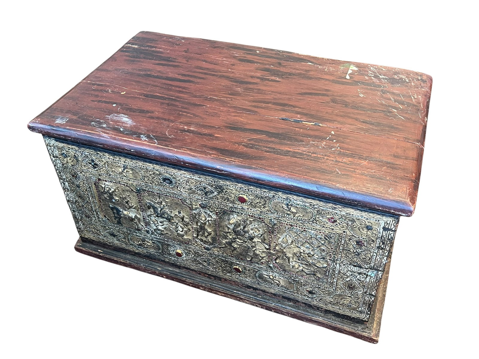 Early Primitive Brass Clad Blanket Chest: This piece is an antique Burmese Sadaik manuscript chest, traditionally crafted in Southeast Asia during the 19th or early 20th century. These ornate trunks were originally designed to preserve