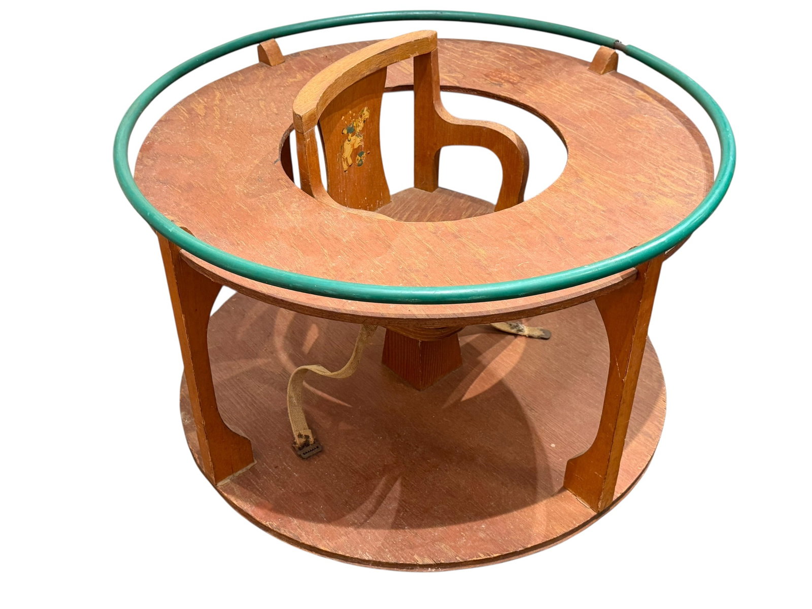 Wooden Baby Walker: The item appears to be a vintage wooden circular baby-tending table, often referred to as a combination safety table, feeding station, or baby walker/play center from the mid-20th century. [1,