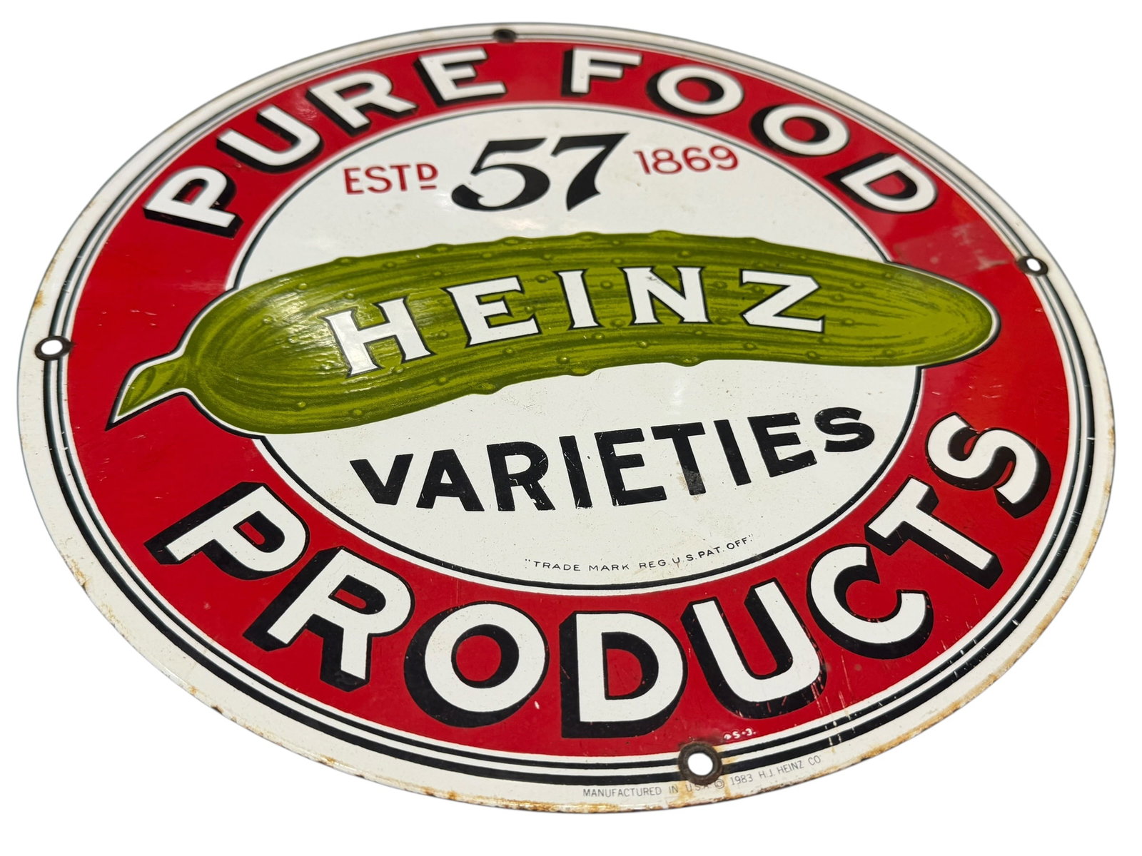 Heinz Porcelain Advertising Sign: This specific item is a reproduction porcelain enamel-on-steel advertising sign originally manufactured in 1983 by Ande Rooney under license from the H.J. Heinz Co. (as indicated by the copyright