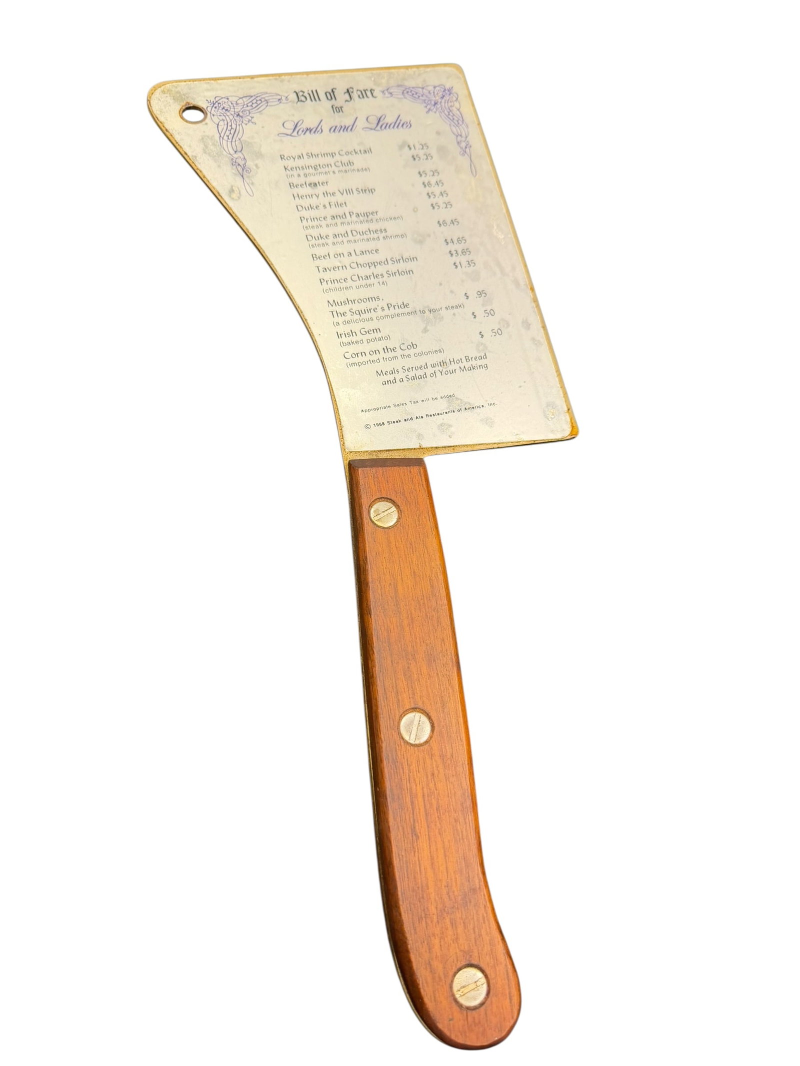 Cleaver “Bill of Fare?? Menu: This appears to be a vintage 1968 novelty "Bill of Fare" menu shaped like a meat cleaver from the former Steak and Ale restaurant chain. [1, 2]The heavy decorative piece features a dull metal blade