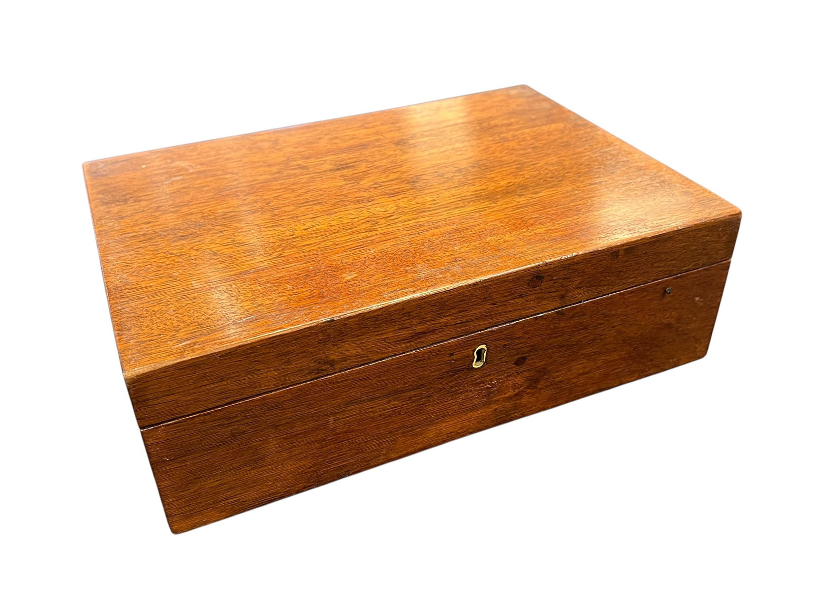Early Box: The image appears to show an antique wooden box, possibly a 19th-century mahogany sewing box or a small writing slope, featuring a rectangular lid and a brass keyhole escutcheon. [1, 2]Material: