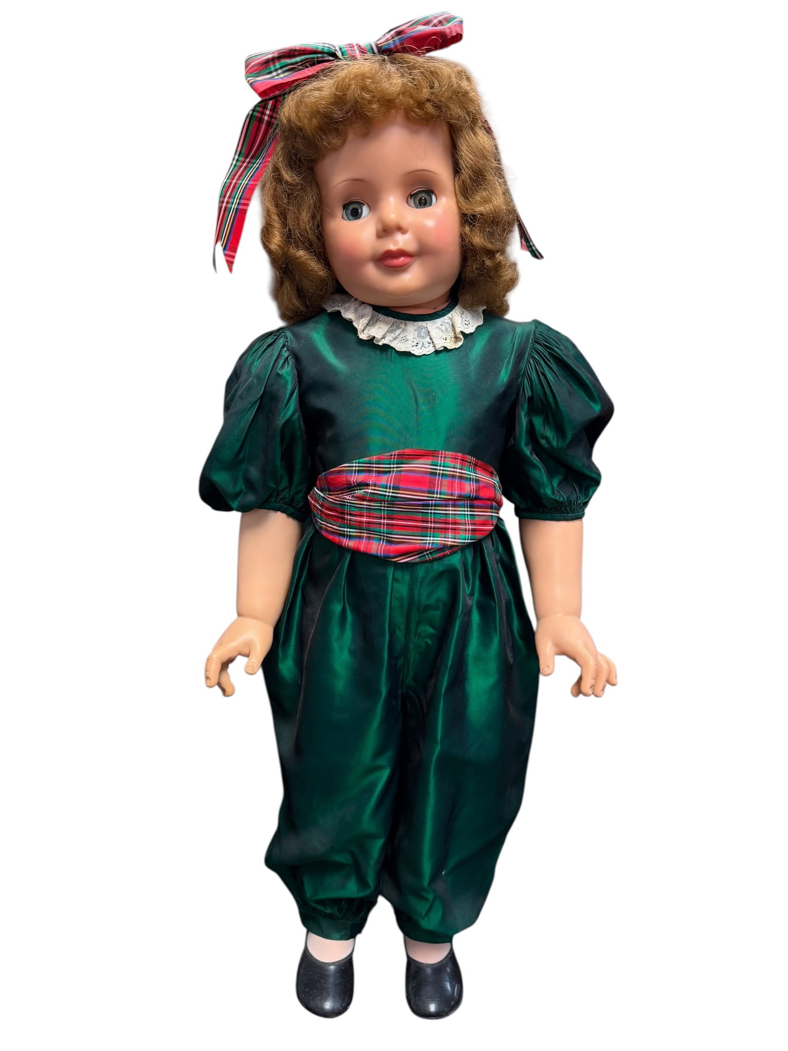 Ideal Vinyl Doll With Green Jumper: This appears to be a vintage mid-century composition or hard plastic walker doll, popular from the late 1940s through the 1950s. Dolls like this were made by famous American manufacturers of the era,