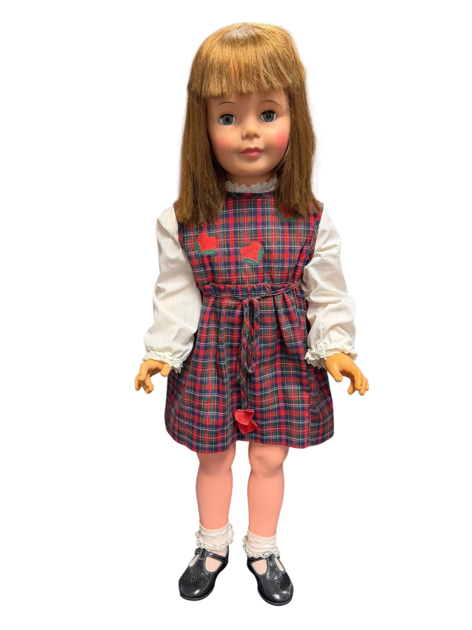 Ideal Pattie Playpal Vinyl Doll With Plaid Dress: vintage Ideal Patti Playpal doll, measuring around 35 to 36 inches tall and wearing a plaid jumper dress with heart appliqués. [1, 2, 3]Created by the Ideal Toy Company starting in the late