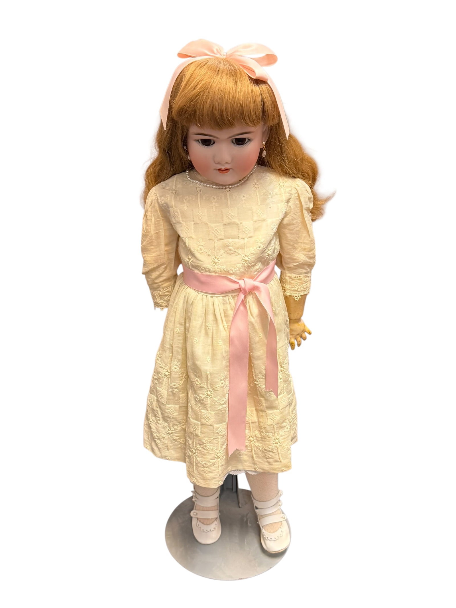 Germany 99 DEP Handwerck Porcelain or Bisque Head Doll: This is an antique German bisque-head doll, a popular and highly collectible type of doll manufactured during the late 19th and early 20th centuries. [1, 2]Key Characteristics & OriginsManufacturer: D