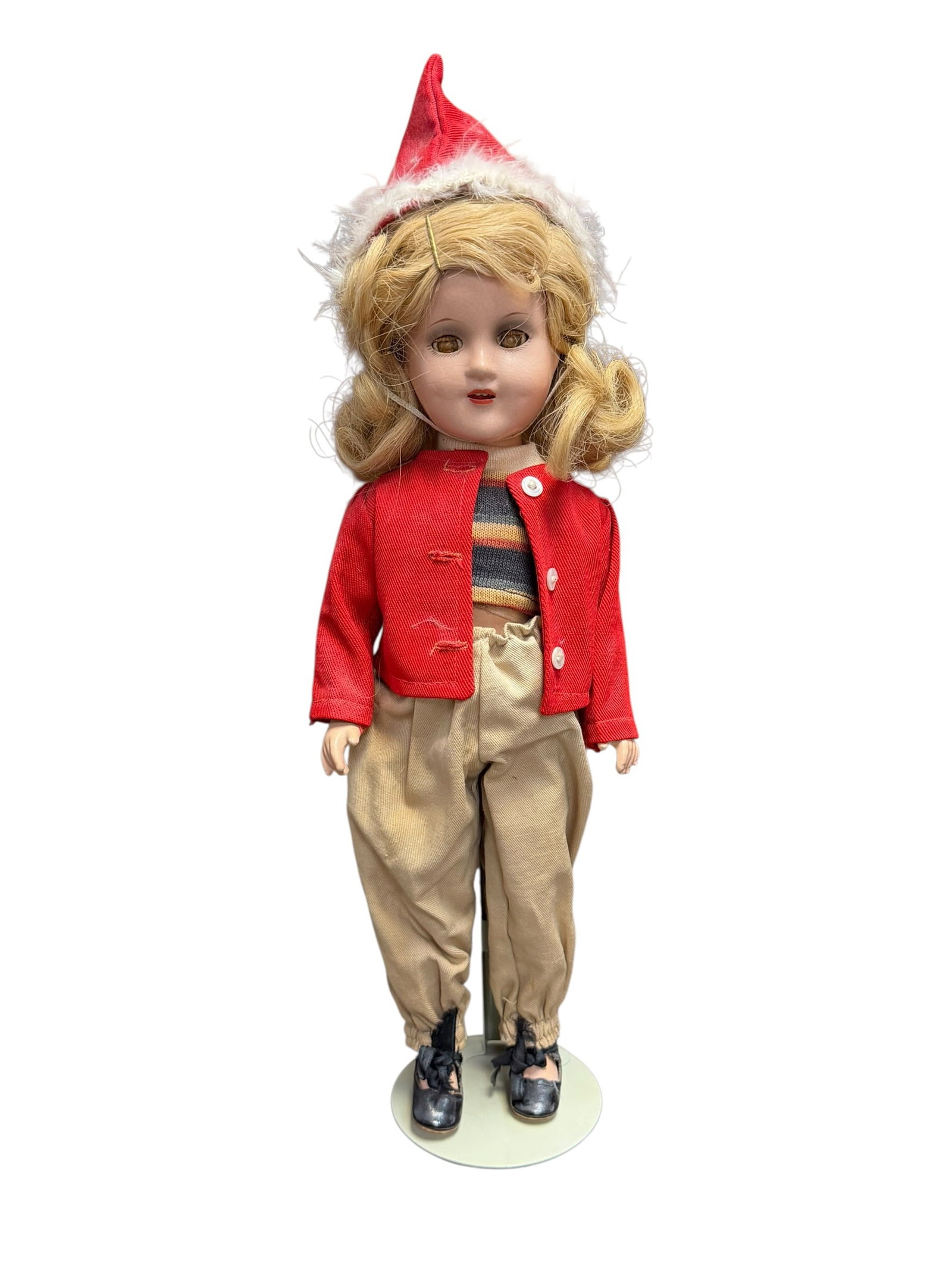 Vintage Plastic Doll: This is a vintage 1930s to 1940s Madame Alexander Sonja Henie skier doll. Produced to celebrate the legendary Olympic figure skater and movie star, this jointed composition doll features blonde hair, 