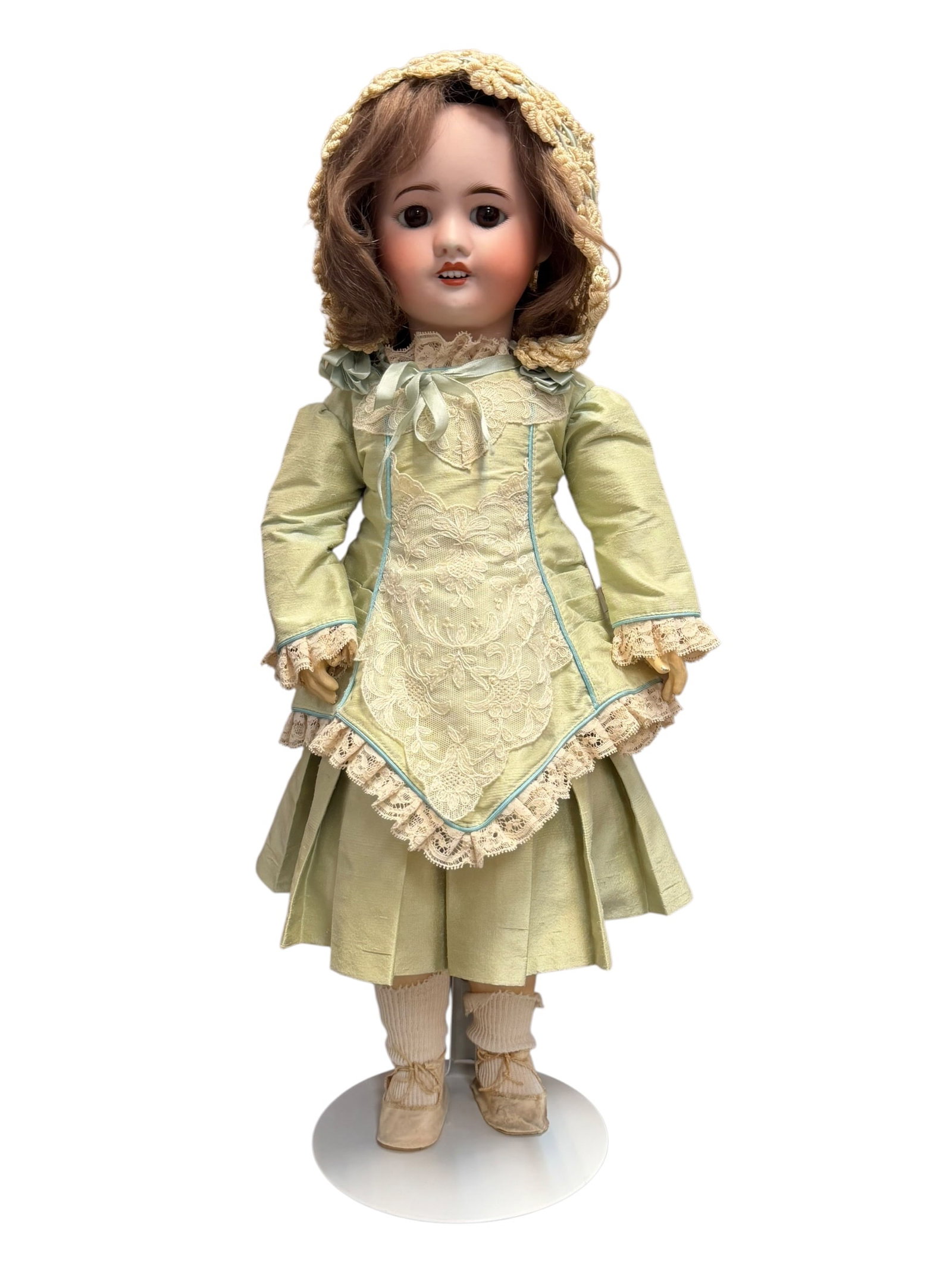 SFBJ 60 Paris Bisque Porcelain Doll: antique bisque doll, likely originating from a late 19th-century or early 20th-century German or French manufacturer.Key Characteristics & Identification FeaturesHead Material: The luminous, smooth