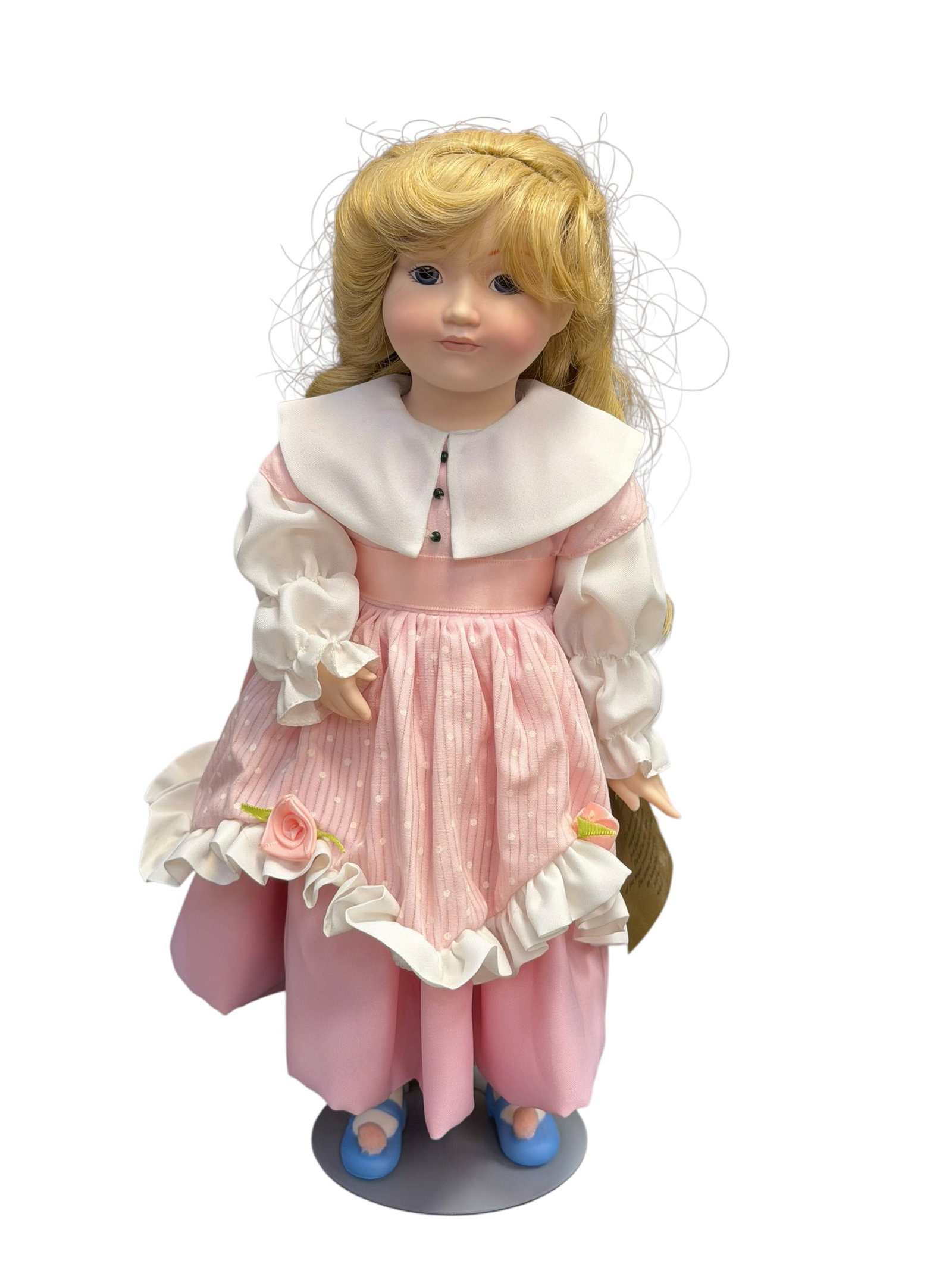 Franklin Heirloom Porcelain “Goldilocks?? Doll: vintage Franklin Heirloom Porcelain Goldilocks Doll designed by Carol Lawson in 1984, featuring a pink polka-dot dress with a wide white collar and blonde hair. [1, 2]Maker: Franklin Mint / Franklin H