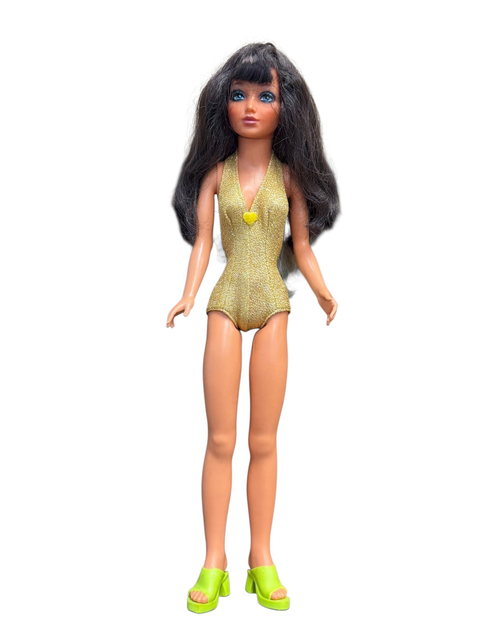 Ideal Tiffany Taylor Fashion Vinyl Doll: vintage hard-plastic walking doll, which appears to resemble an Ideal Saucy Walker doll from the 1950s. [1, 2]Key FeaturesDesign: Hard-plastic construction with moving head and side-to-side "flirty"