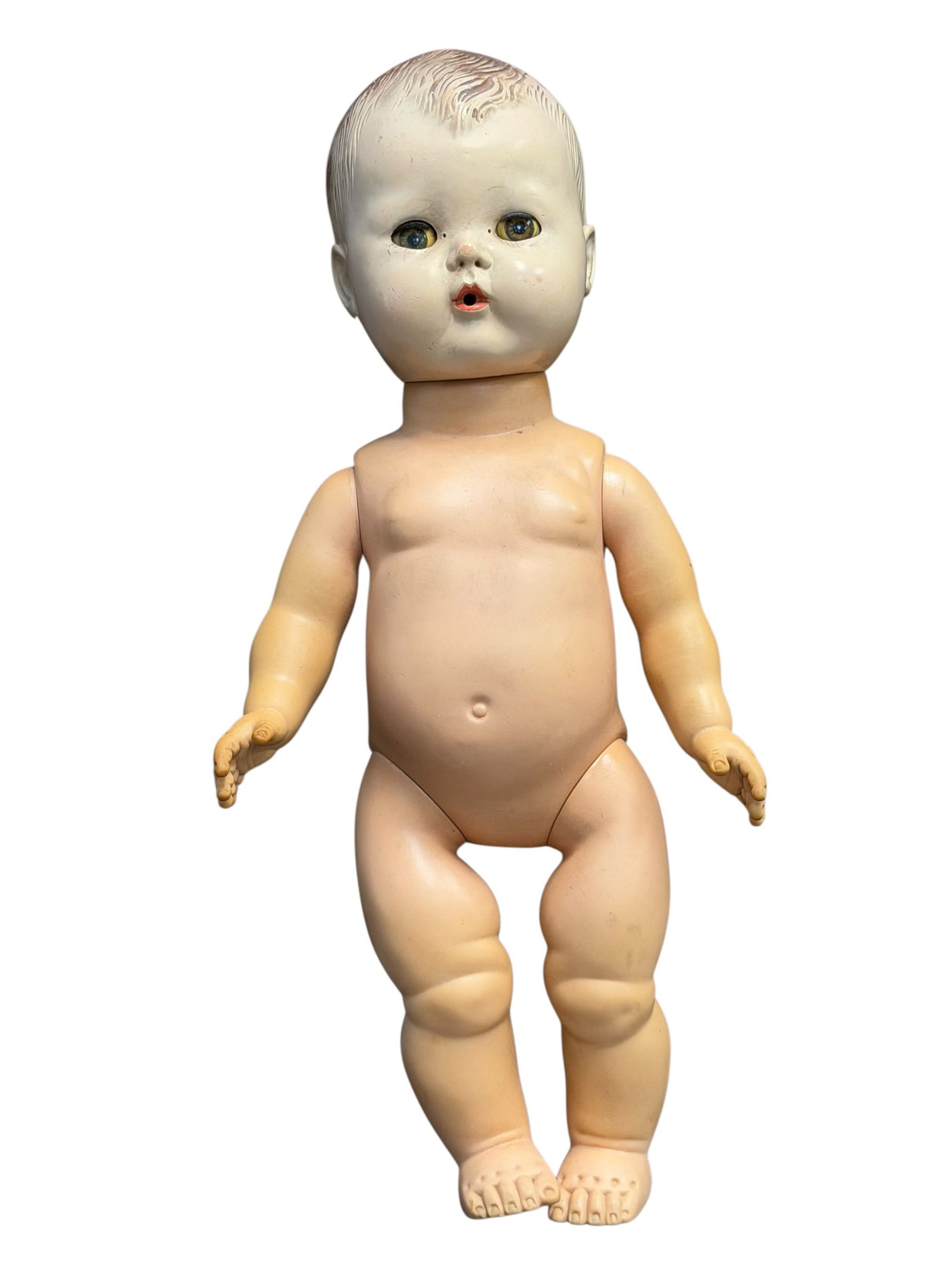 Rubber-Body Dy-Dee Style Baby Doll: vintage Effanbee Dy-Dee Baby doll or a similar mid-20th-century drinking and wetting rubber baby doll, featuring jointed limbs, molded painted hair, and a soft rubber or composition body