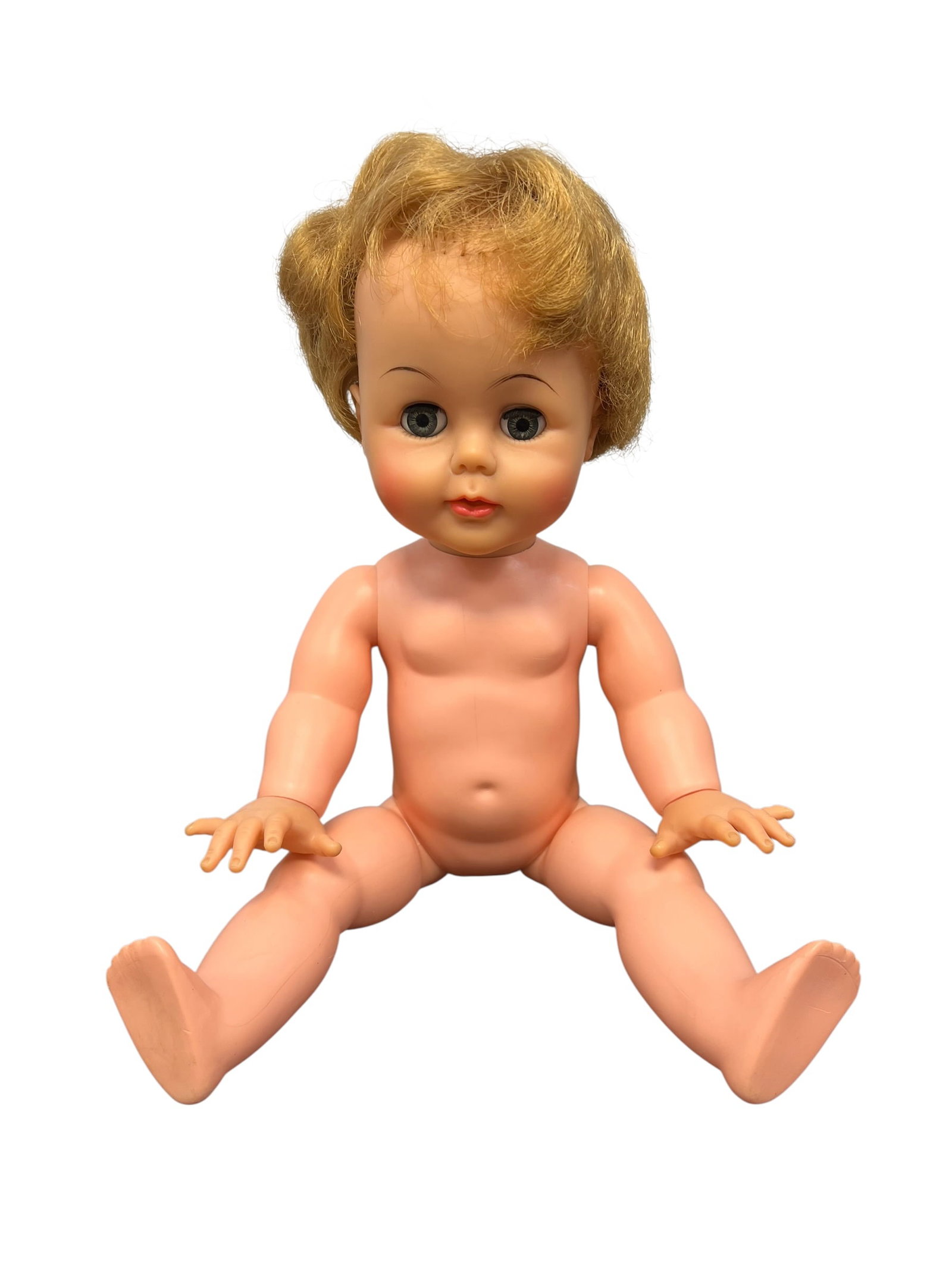 Ideal Vinyl Head Doll: vintage Ideal Kissy Doll by the Ideal Toy Corporation from the early 1960s. [1]It resembles a toddler doll with molded blonde or light brown hair and side-glancing sleepy eyes.Similar models from