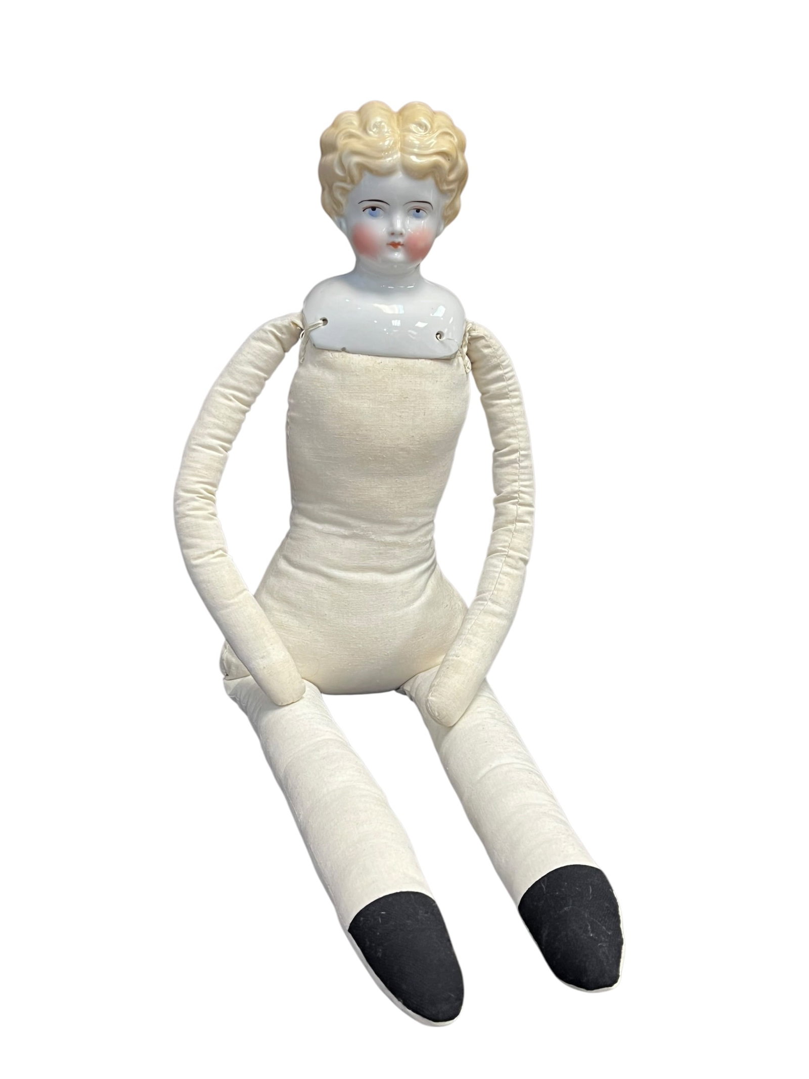 Vintage Germany China Head Doll: antique blonde china head doll, typically dating from the late 19th century to early 20th century (circa 1880s–1910s). [1, 2]Key Characteristics & Identification:The Head & Shoulder Plate: The