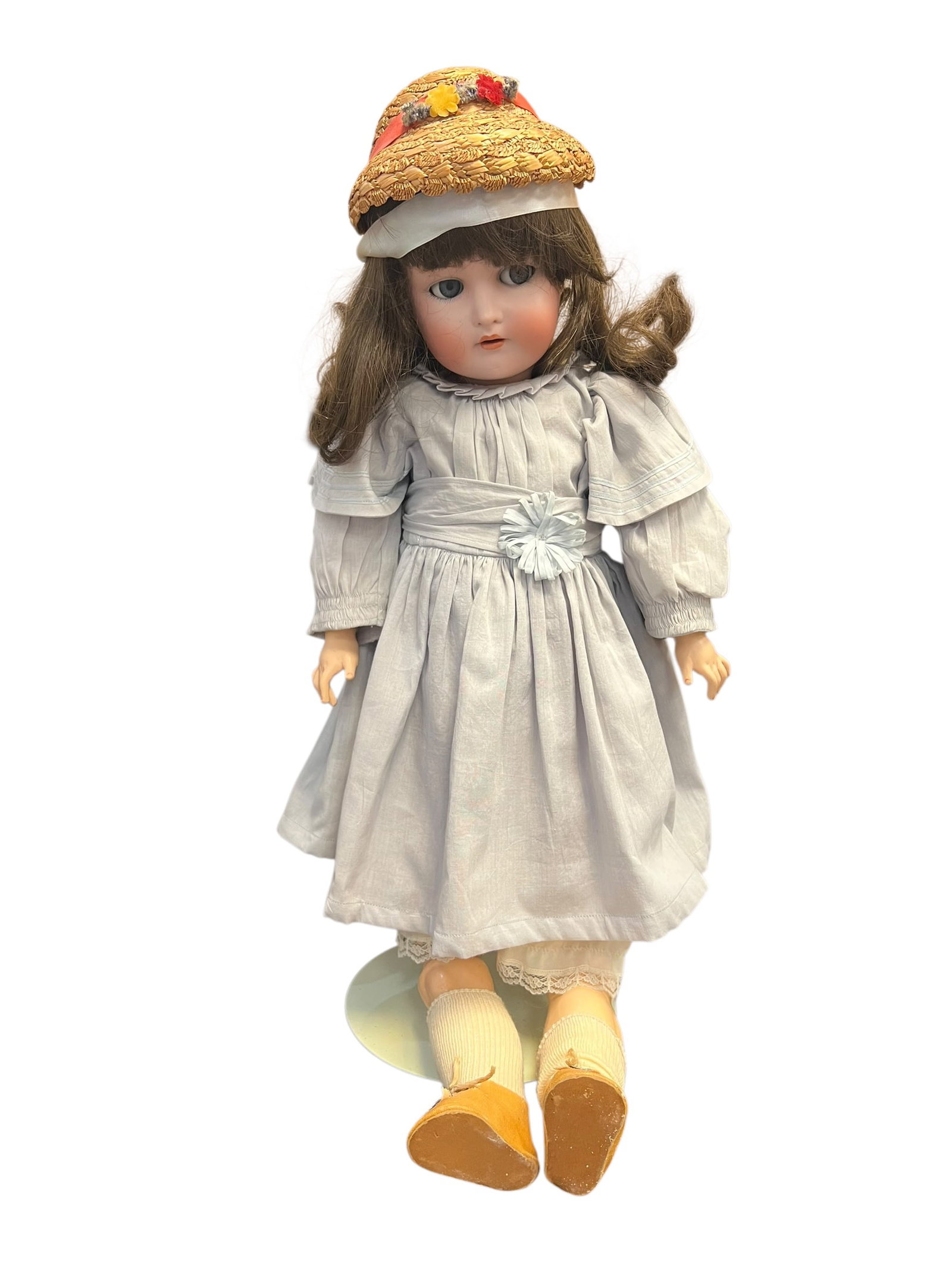 S&H Germany Bisque Head Doll: vintage or antique bisque doll with delicate porcelain features, brown hair, and an elegant dress ensemble.