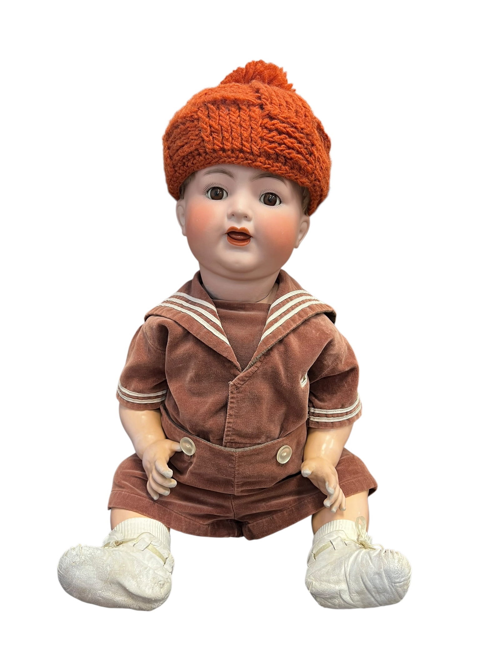 S&H Germany Bisque Head Doll: vintage German bisque or composition character baby doll designed to resemble a toddler or infant. It is styled in a classic mid-century or earlier brown velvet sailor suit with contrasting white