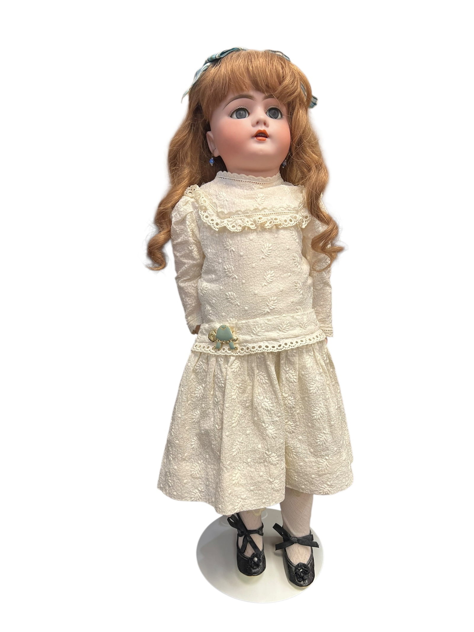 Germany DEP Bisque Head Doll: antique bisque-head doll, likely crafted by a European manufacturer such as Simon & Halbig or a similar maker from the late 19th or early 20th century, wearing a vintage-style lace-trimmed cream