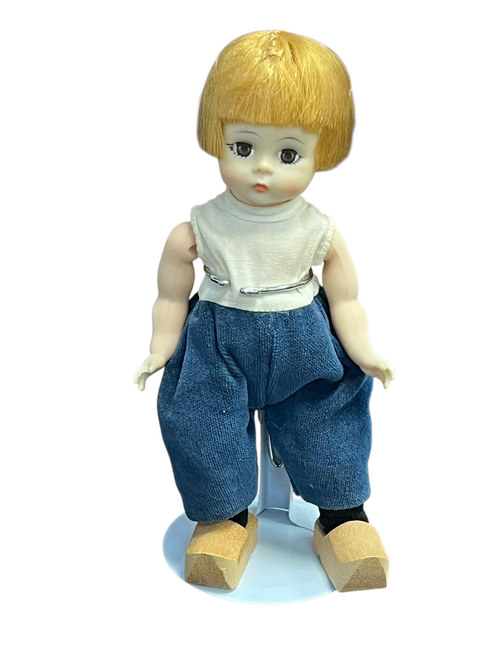 “Alex?? Bisque Head Doll: This vintage doll is the Netherlands Boy (also known as the Dutch Boy, style #577) from the Madame Alexander International Collection. [1, 2, 3]This specific 8-inch hard-plastic doll is missing its
