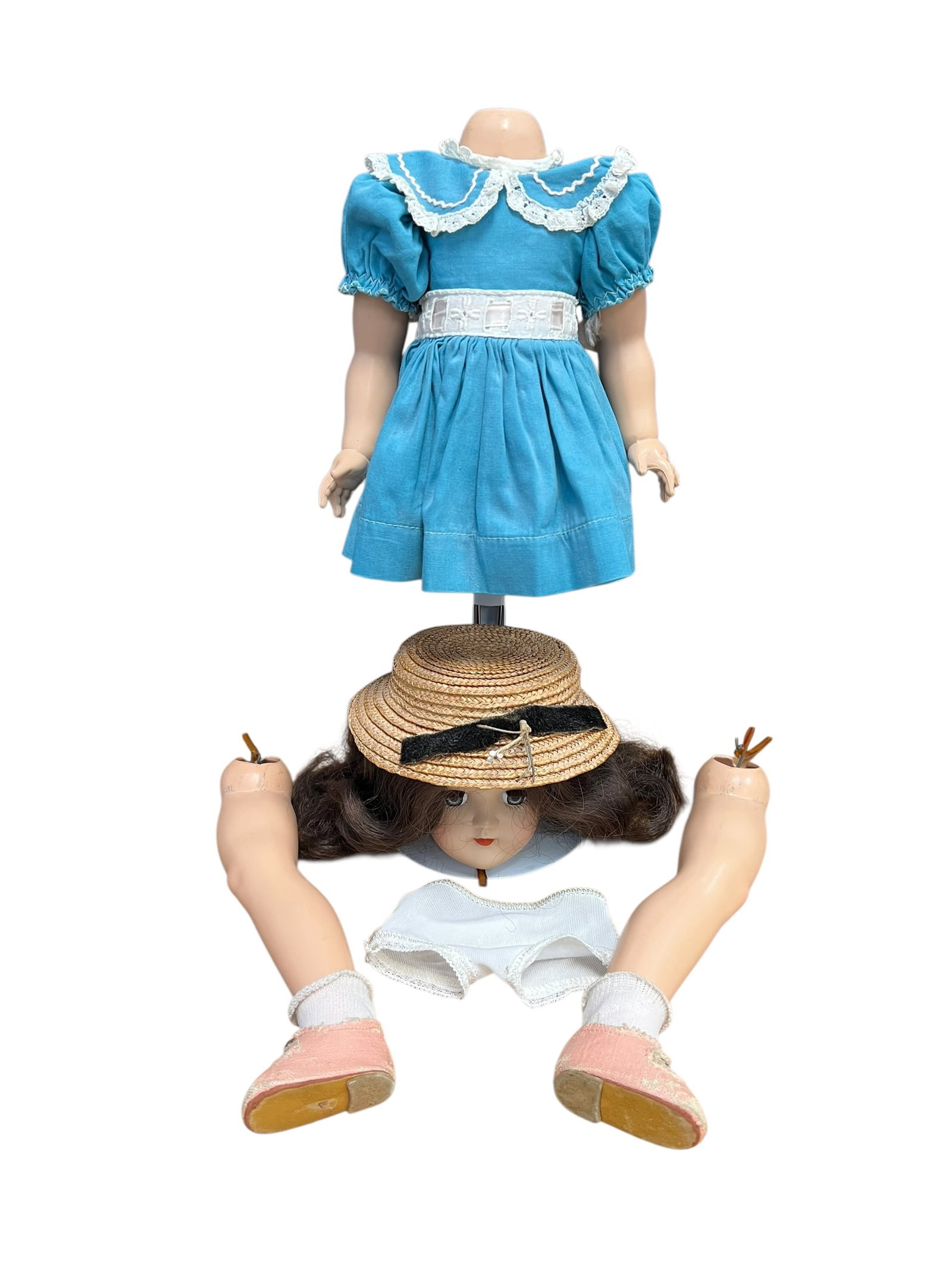 Ideal Plastic Doll: disassembled vintage doll and its clothing, presented in separate components ready for repair or restoration.Included ItemsDoll Components:A composition doll head with brown molded or synthetic hair