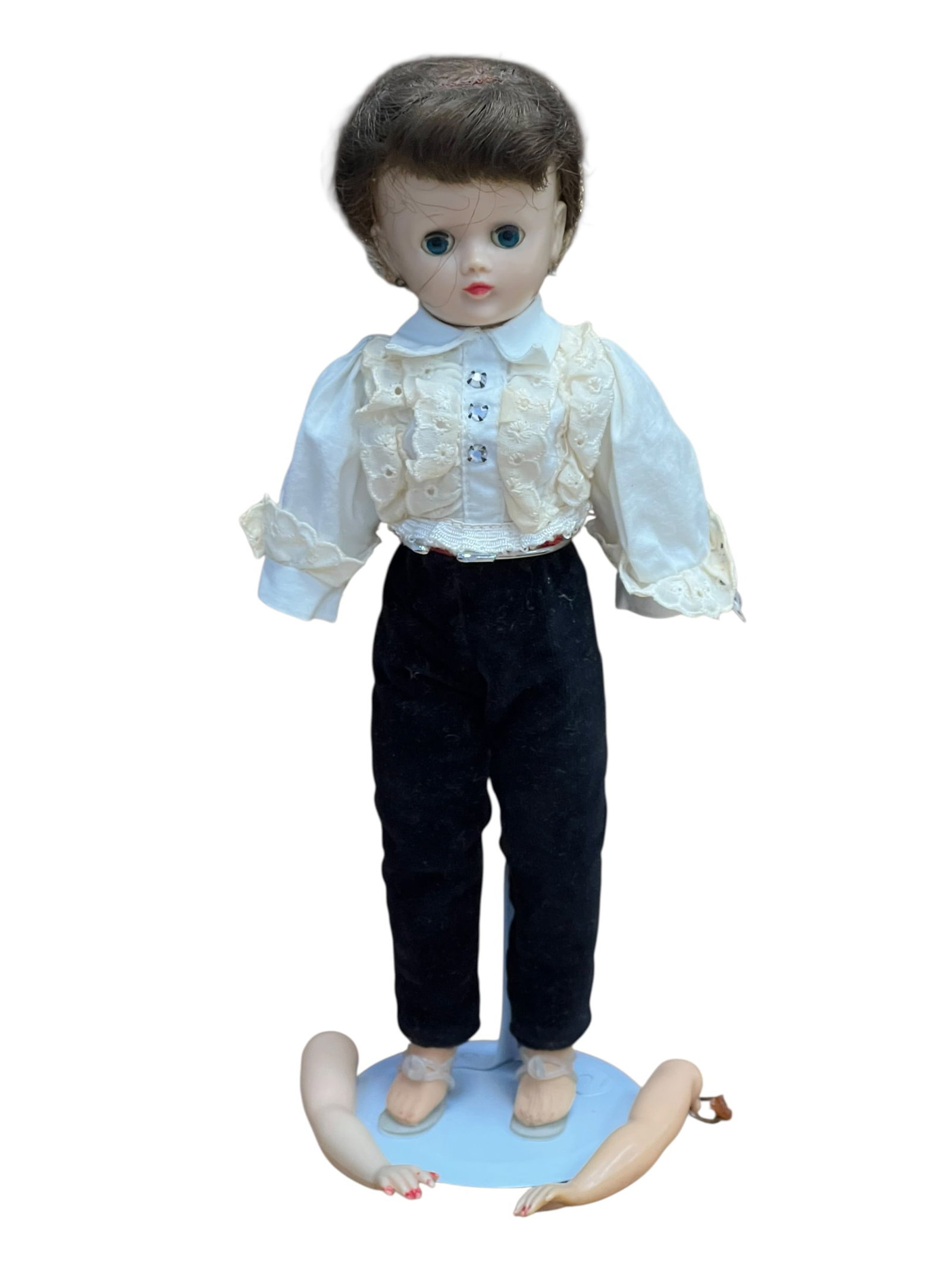 Vogue “Jill?? Plastic Doll: Based on the visual style, facial features, and specific outfit composition, this item is a vintage fashion doll from the 1950s, appearing to be a Vogue Jill doll or a Madame Alexander Cissette doll. 