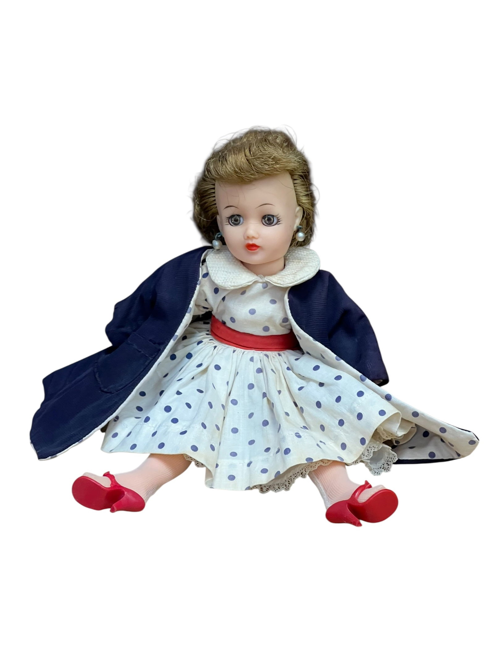 Ideal Vinyl Doll: This is a vintage mid-century Madame Alexander Cissette doll, first introduced in 1957 as a smaller, 10-inch version of the famous 20-inch Cissy fashion doll. [1]Key Characteristics & FeaturesModel: