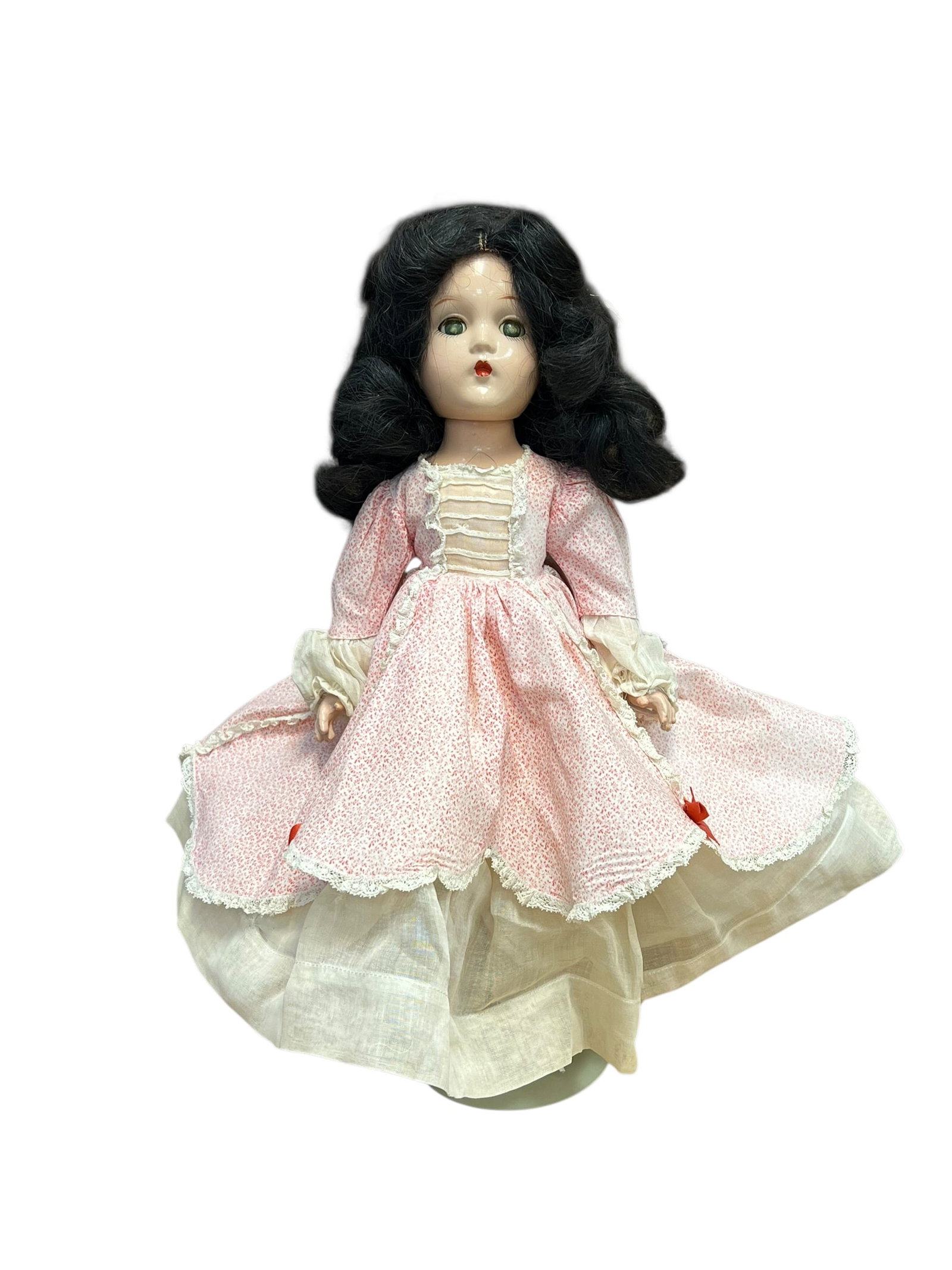Madame Alexander Composition Doll: vintage composition doll dressed as the iconic character Scarlett O'Hara from Gone with the Wind. [1]Key Characteristics & IdentificationEra & Build: This style typically dates back to the late 1930s