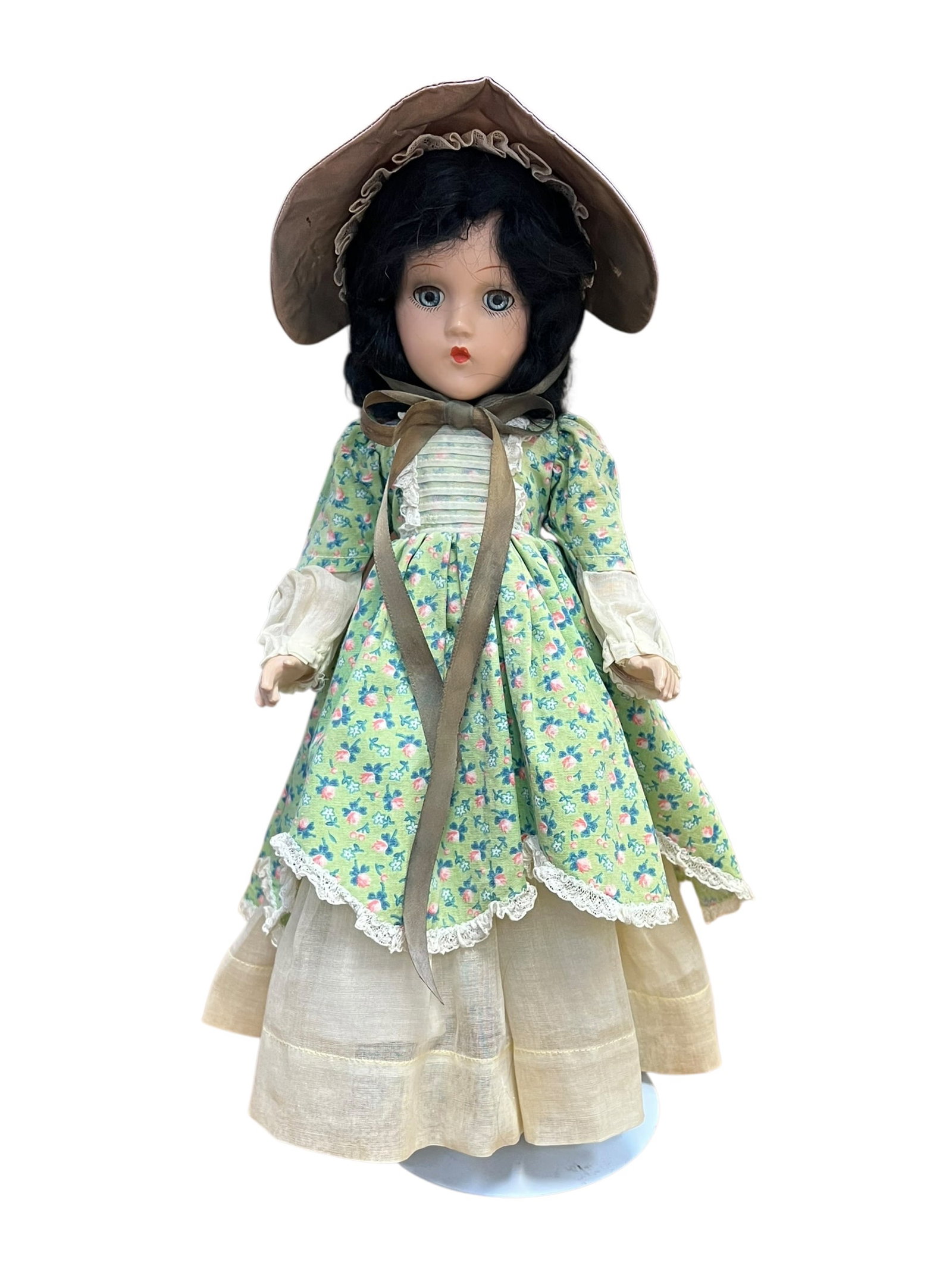 Madame Alexander Composition Doll: This item appears to be a vintage Madame Alexander style collectible doll dressed in a green floral gown and bonnet, reminiscent of Scarlett O'Hara from Gone with the Wind. [1, 2]Key FeaturesFace and