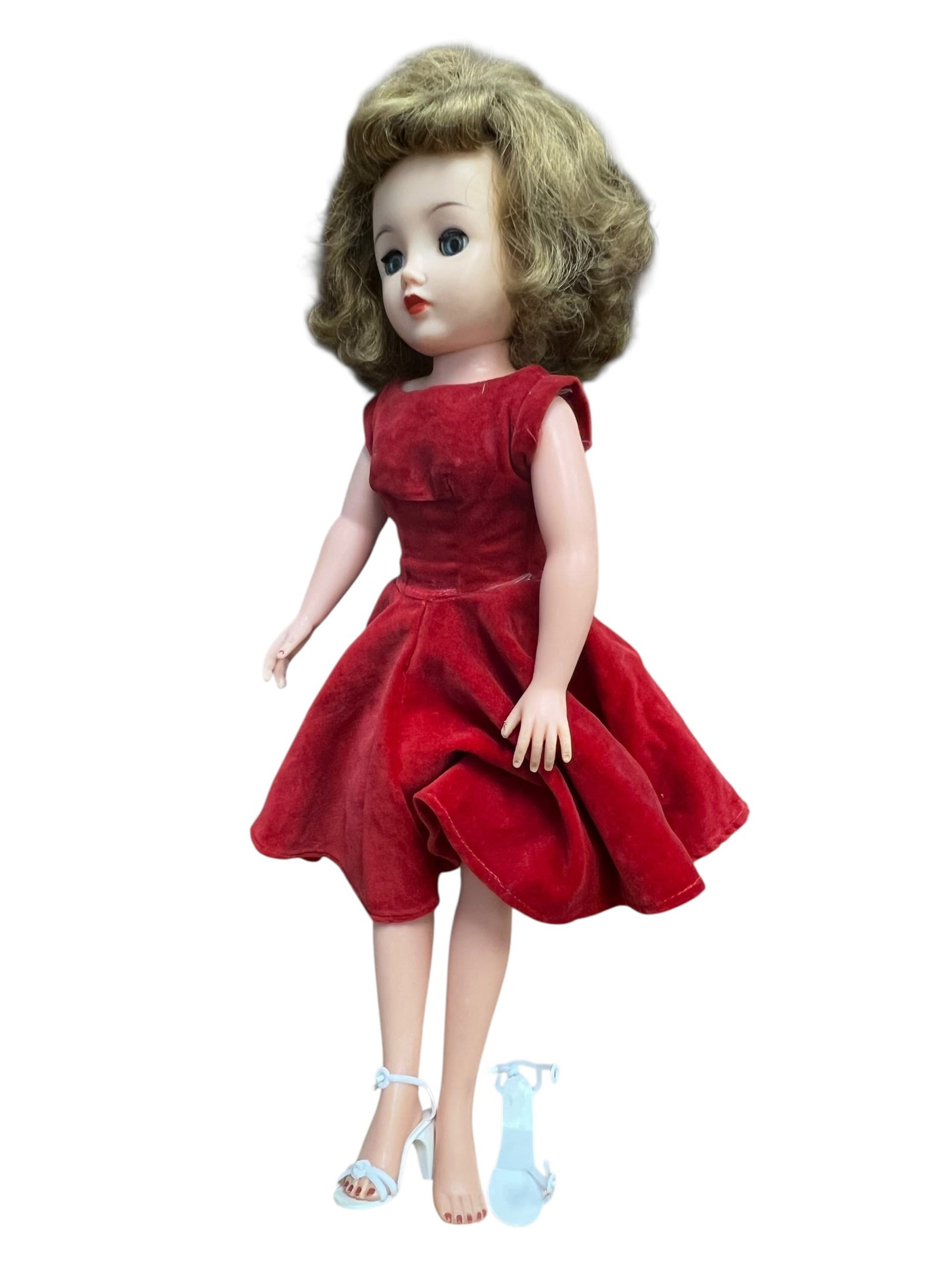 Ideal Vinyl Doll: vintage 1950s Miss Revlon fashion doll, originally produced by the Ideal Toy Company. [1, 2]This collectible vinyl doll features the signature jointed body, high-heel feet, styled mid-century hair,