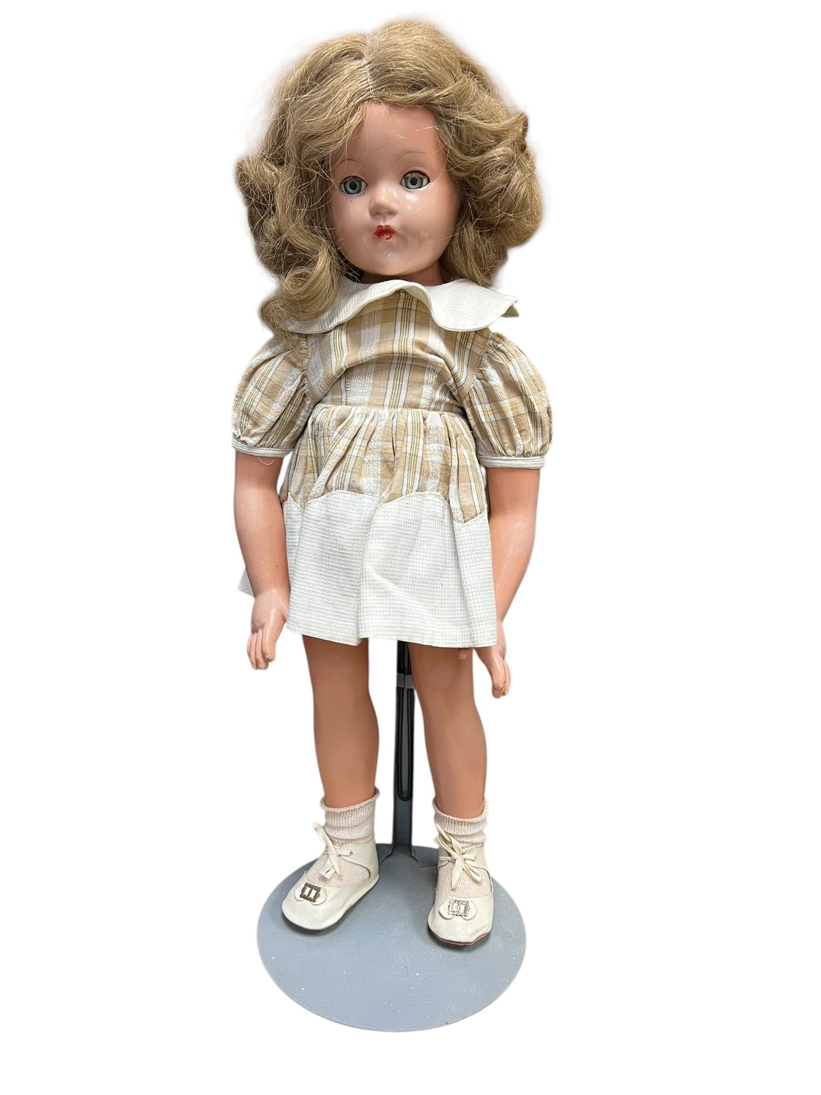 Effanbee Porcelain Head Doll: This item is a vintage composition doll, closely matching the design of mid-20th century classic character dolls like the Effanbee "Anne Shirley" Doll and various Ideal Shirley Temple Look-Alikes from