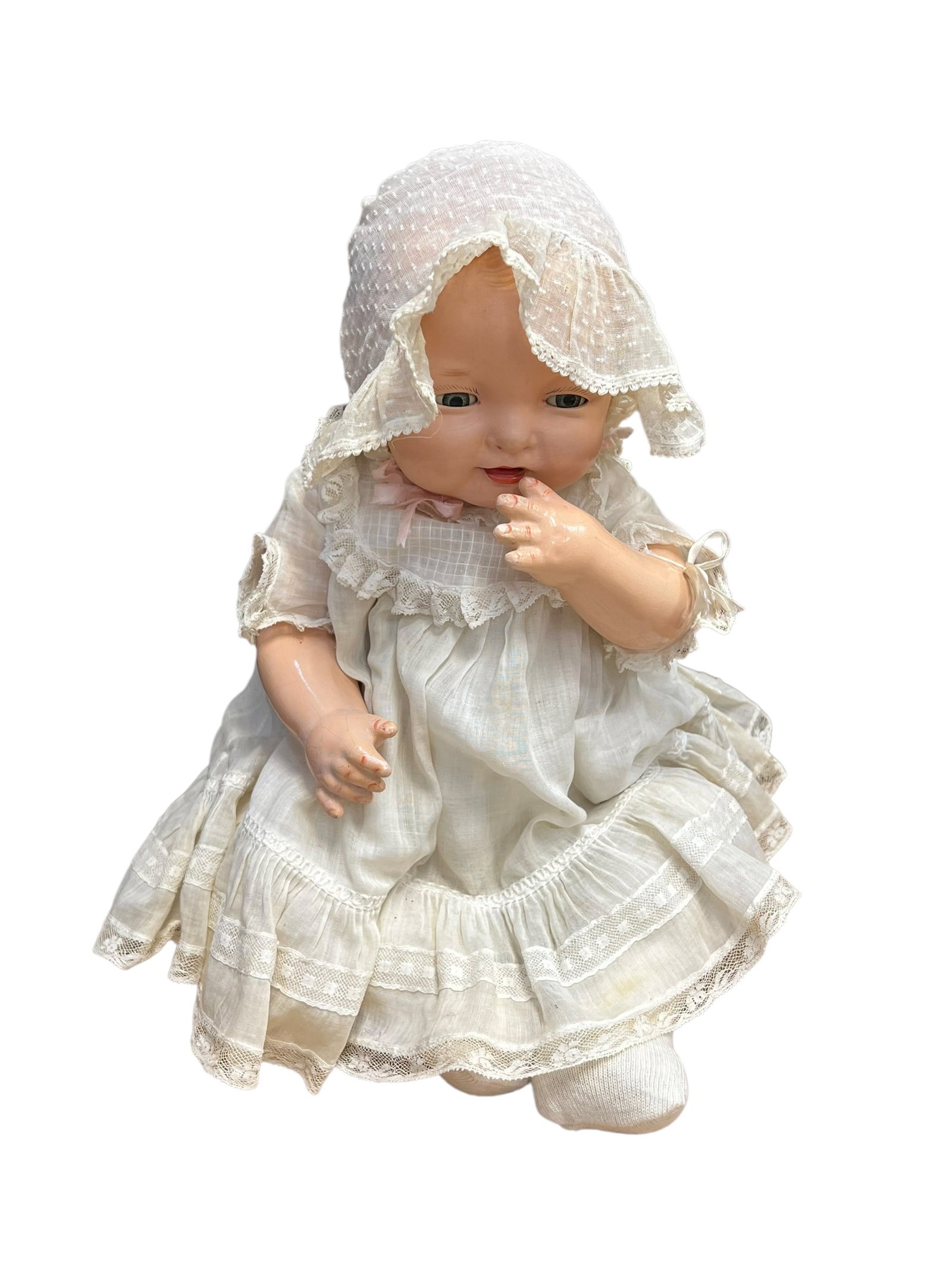 1924 Effanbee Doll: antique Effanbee Bubbles composition baby doll from the 1920s, wearing a white lace-trimmed dress and matching bonnet
