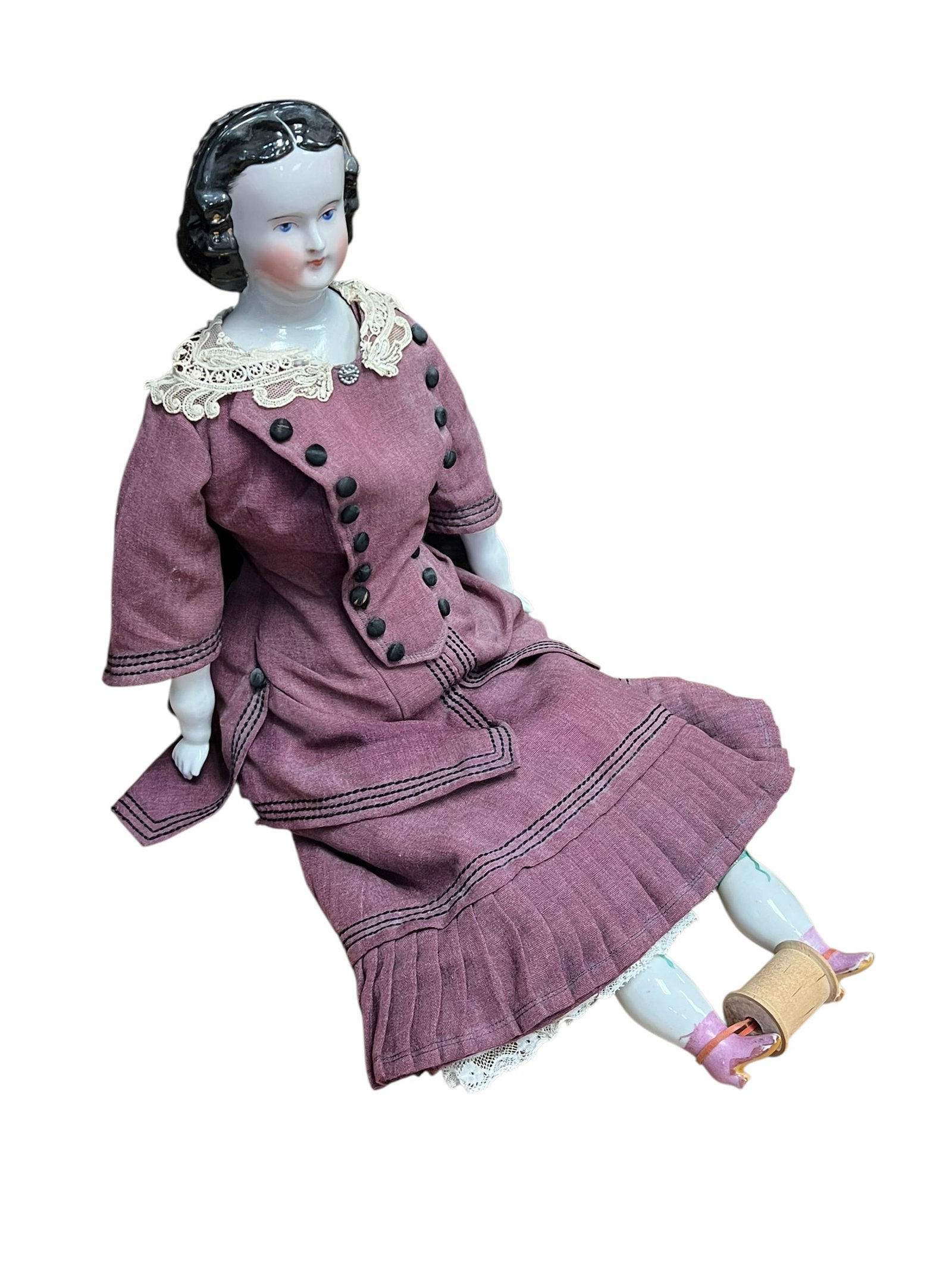 China Head Doll: The item appears to be a vintage 1950s hard plastic walking doll, resembling classic dolls like the Ideal Saucy Walker or Sweet Sue by American Character, dressed in a purple and lavender outfit with