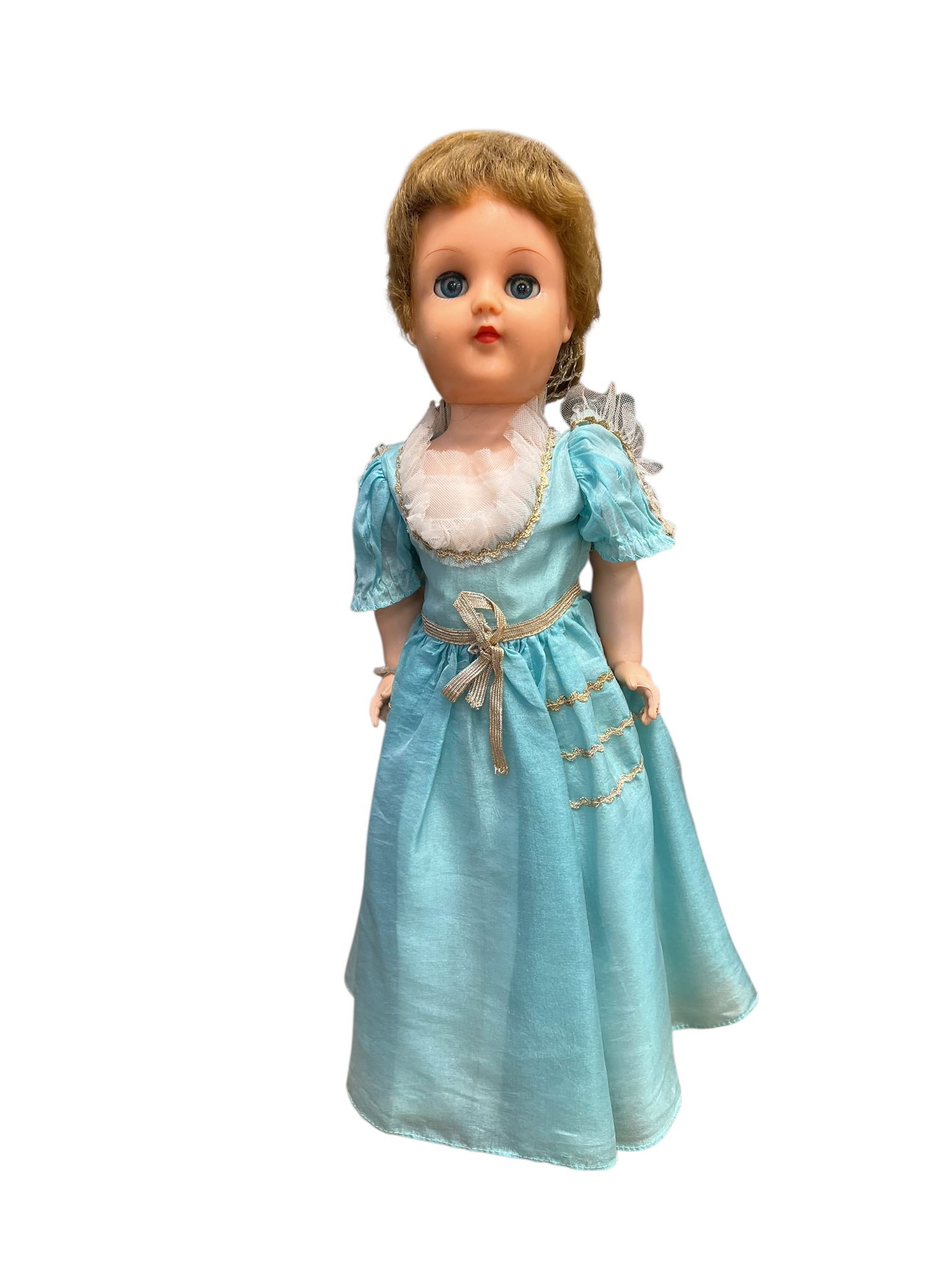 Ideal Vinyl Doll: This is a vintage hard plastic walker doll dating from the mid-1950s (circa 1954–1955). [1, 2]She is highly characteristic of the popular mid-century fashion dolls produced by American