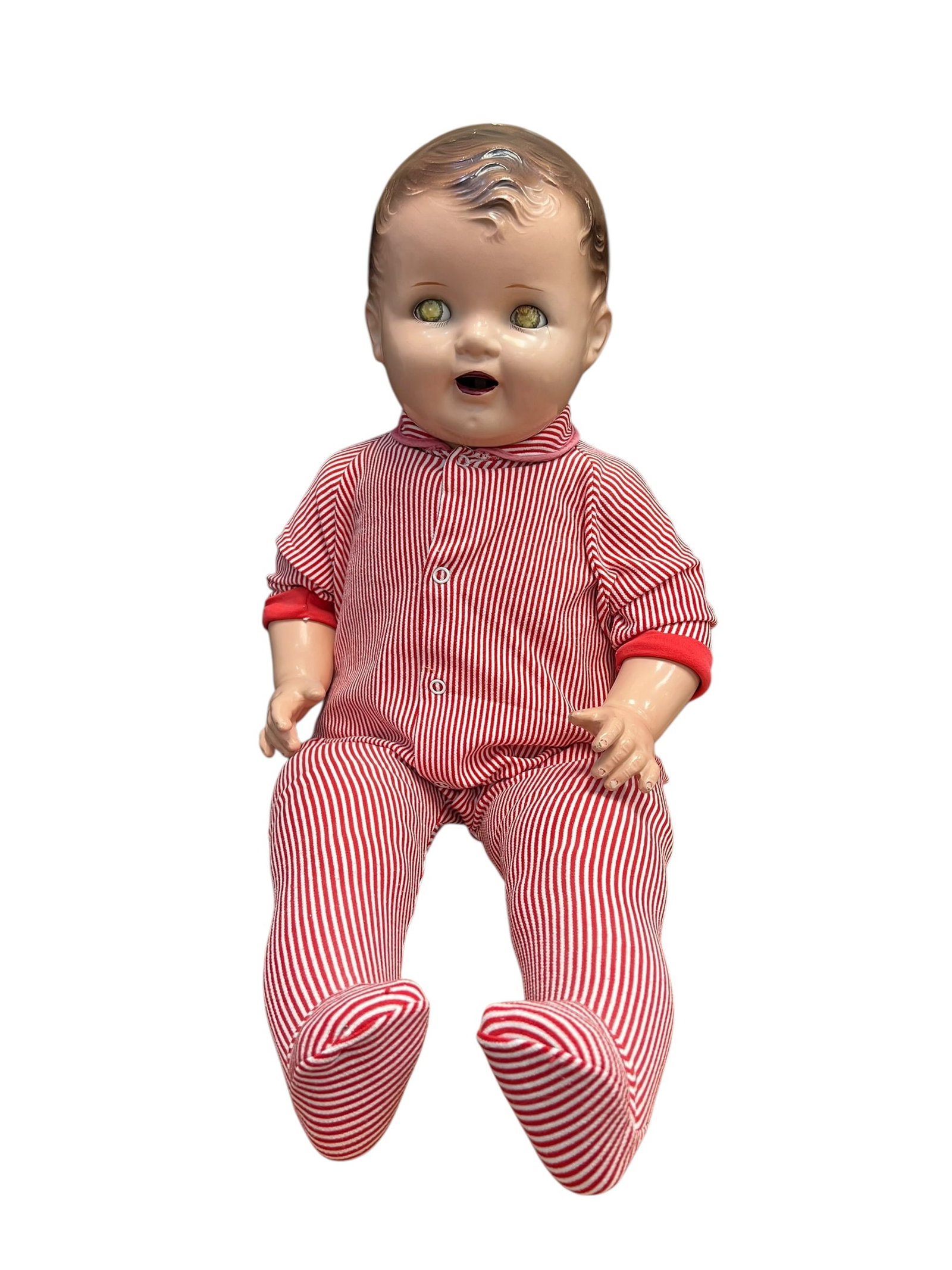 Ideal Composition Doll: This is a vintage baby doll, characteristic of the mid-20th century (typically from the 1950s or 1960s), featuring a hard plastic or composition head, molded painted hair with a distinctive curl