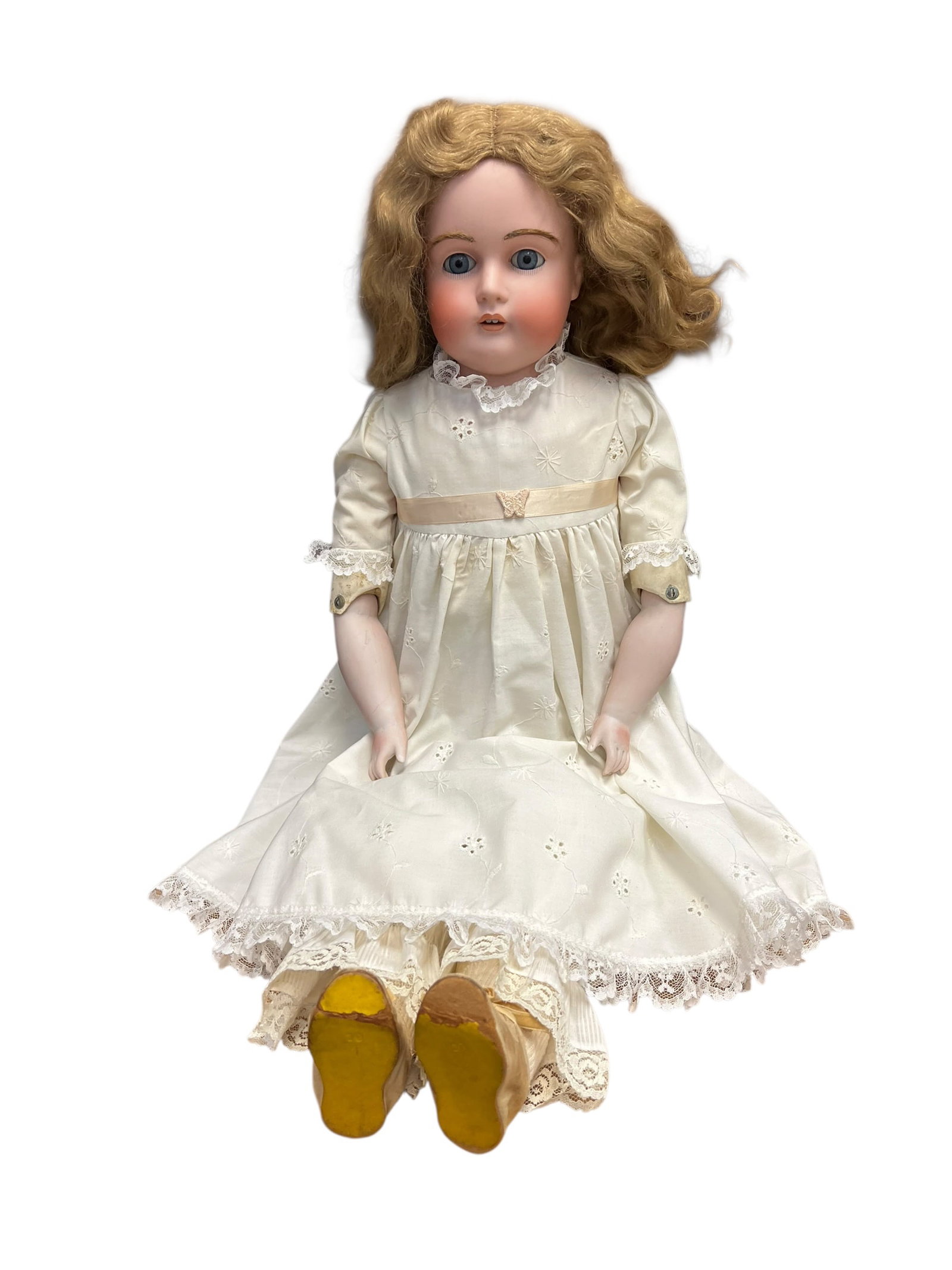 199 15 German Bisque Socket-HeadDoll: antique German bisque socket-head doll, likely dating from the late 19th to early 20th century (circa 1890–1915). [1, 2]Key CharacteristicsHead Materials: Crafted from fine bisque (unglazed tinted