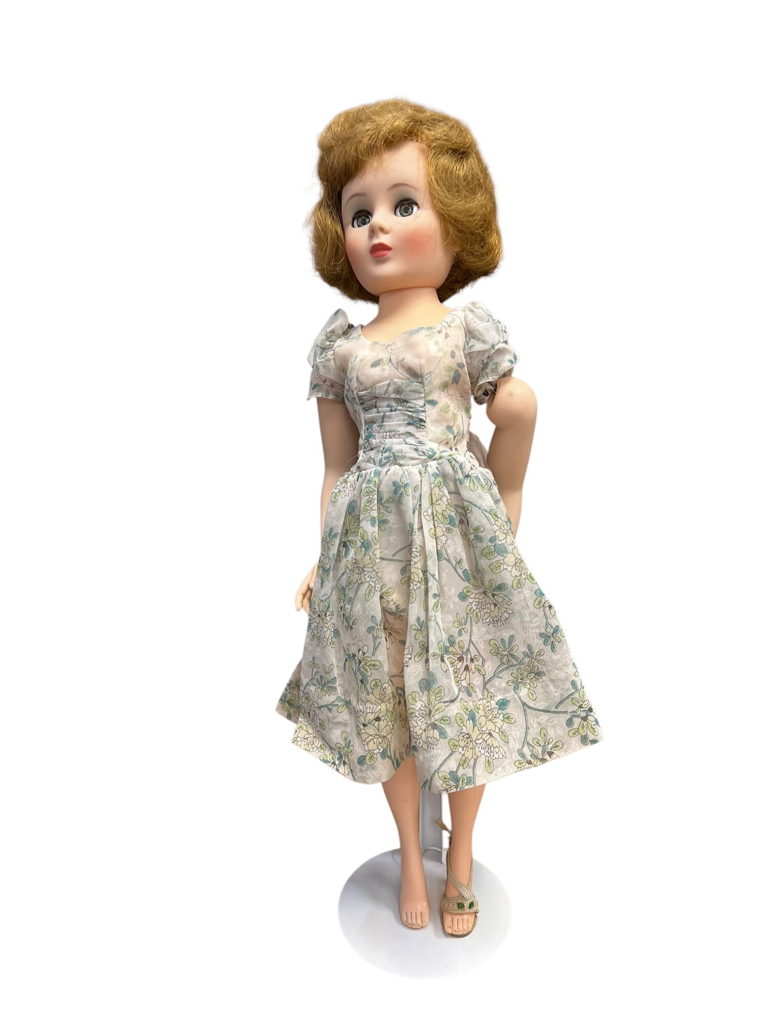 Ideal Style Vinyl Doll: vintage Miss Revlon fashion doll, manufactured by the Ideal Toy Company in the late 1950s. [1, 2]She is dressed in her iconic "Butterfly Dress" (frequently referred to by collectors as the "Garden