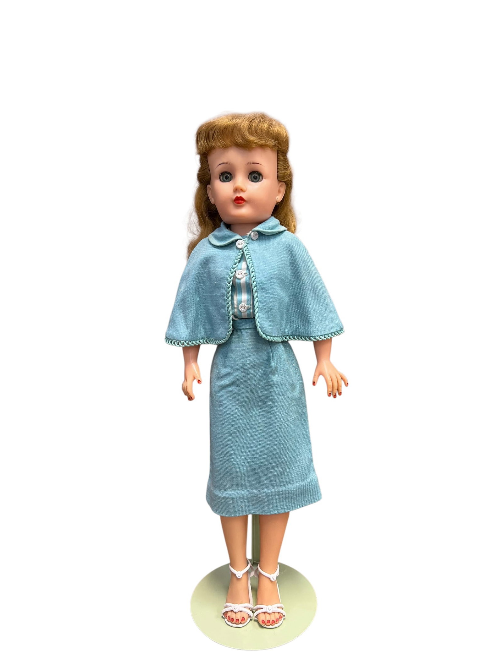 Ideal Vinyl Doll: This is a vintage 1950s high-heel fashion doll, which appears to be a classic Miss Revlon doll produced by Ideal Toy Company, or a visually similar competitor of that era like American Character's