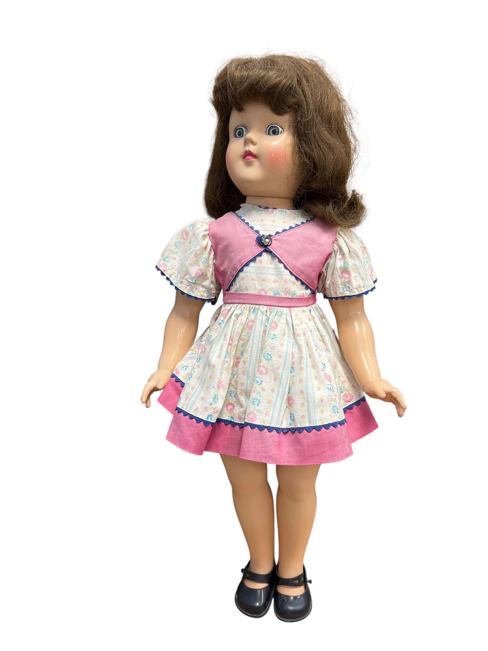 Ideal Plastic Doll: This is a vintage hard plastic doll from the 1950s, which closely shares characteristics with the Ideal Posie Walker and Ideal Toni doll lines. [1, 2]Key Details & CharacteristicsFeatures: It