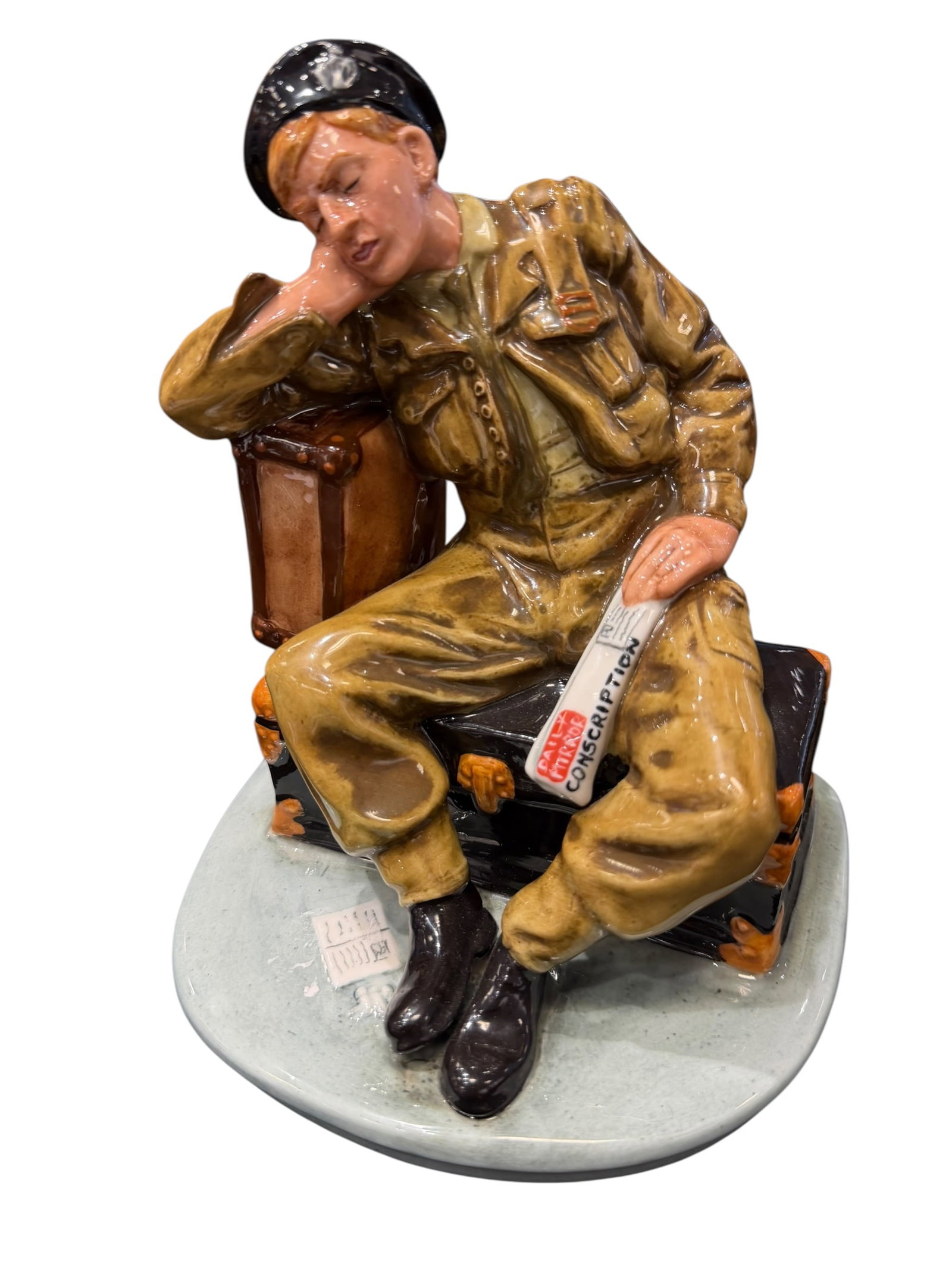 Royal Doulton "The Railway Sleeper?? Porcelain Figurine: Royal Doulton Classics “The Railway Sleeper,” HN 4418, limited-edition fine china figurine. This detailed piece depicts a uniformed railway serviceman or porter asleep while seated on a bench 