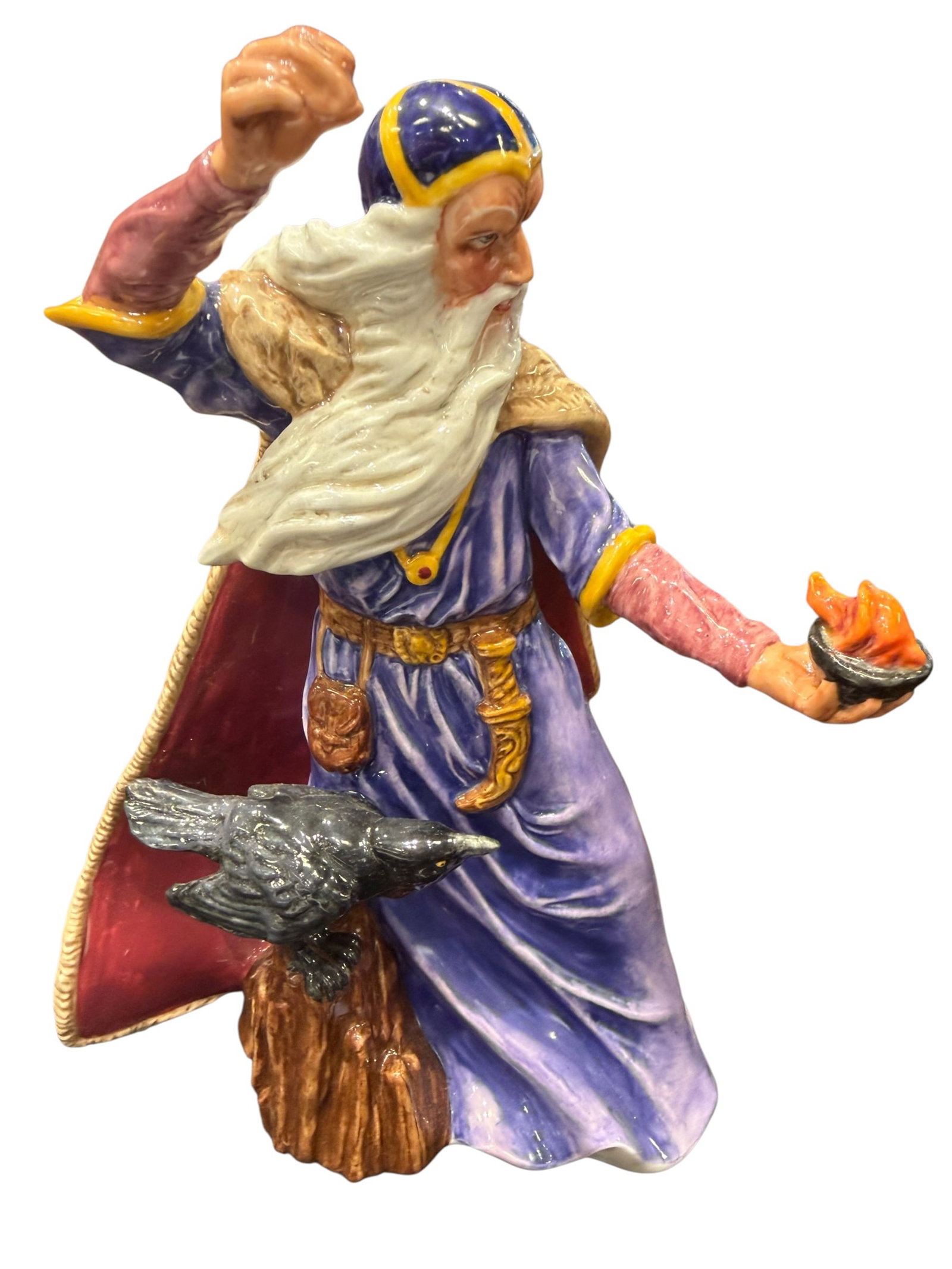 Royal Doulton "The Sorcerer?? Porcelain Figurine: Royal Doulton “The Sorcerer,” HN 4252, hand-made and hand-decorated porcelain figurine, made in England. This highly detailed fantasy figure depicts an elderly bearded sorcerer in a flowing pu