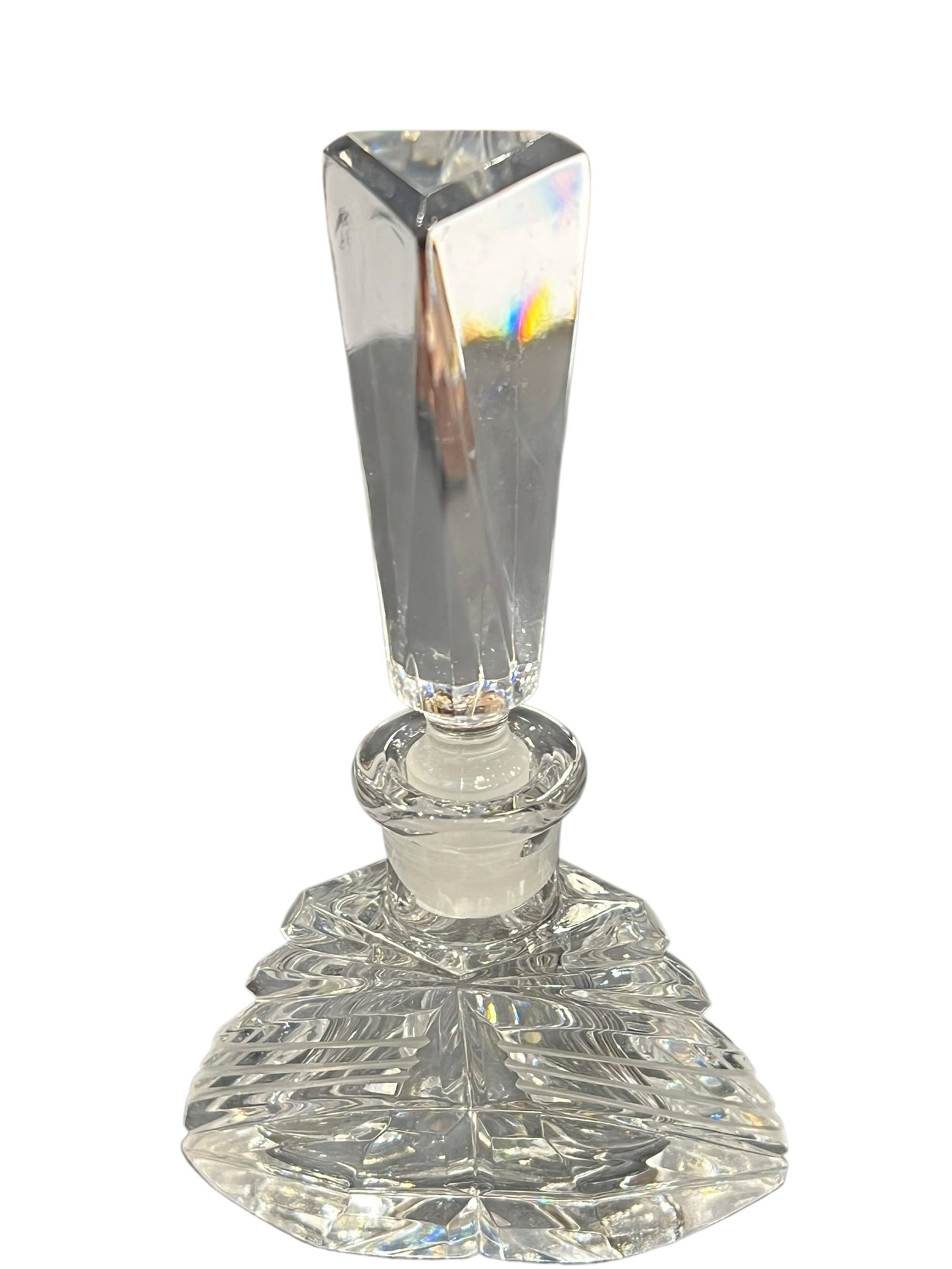 Vintage Czech Bohemian 24% Lead Crystal Perfume Bottle with Faceted Stopper: Elegant vintage clear lead crystal perfume/decanter bottle, hand cut in the Czech Republic. The bottle features a low, flared geometric form with deeply cut fan, leaf, and starburst decoration that pr