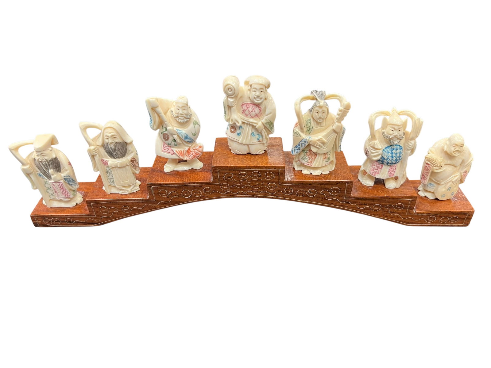 Set of Seven Asian Carved Figural Immortals on Inlaid Wood Display Stand (1 of 9)