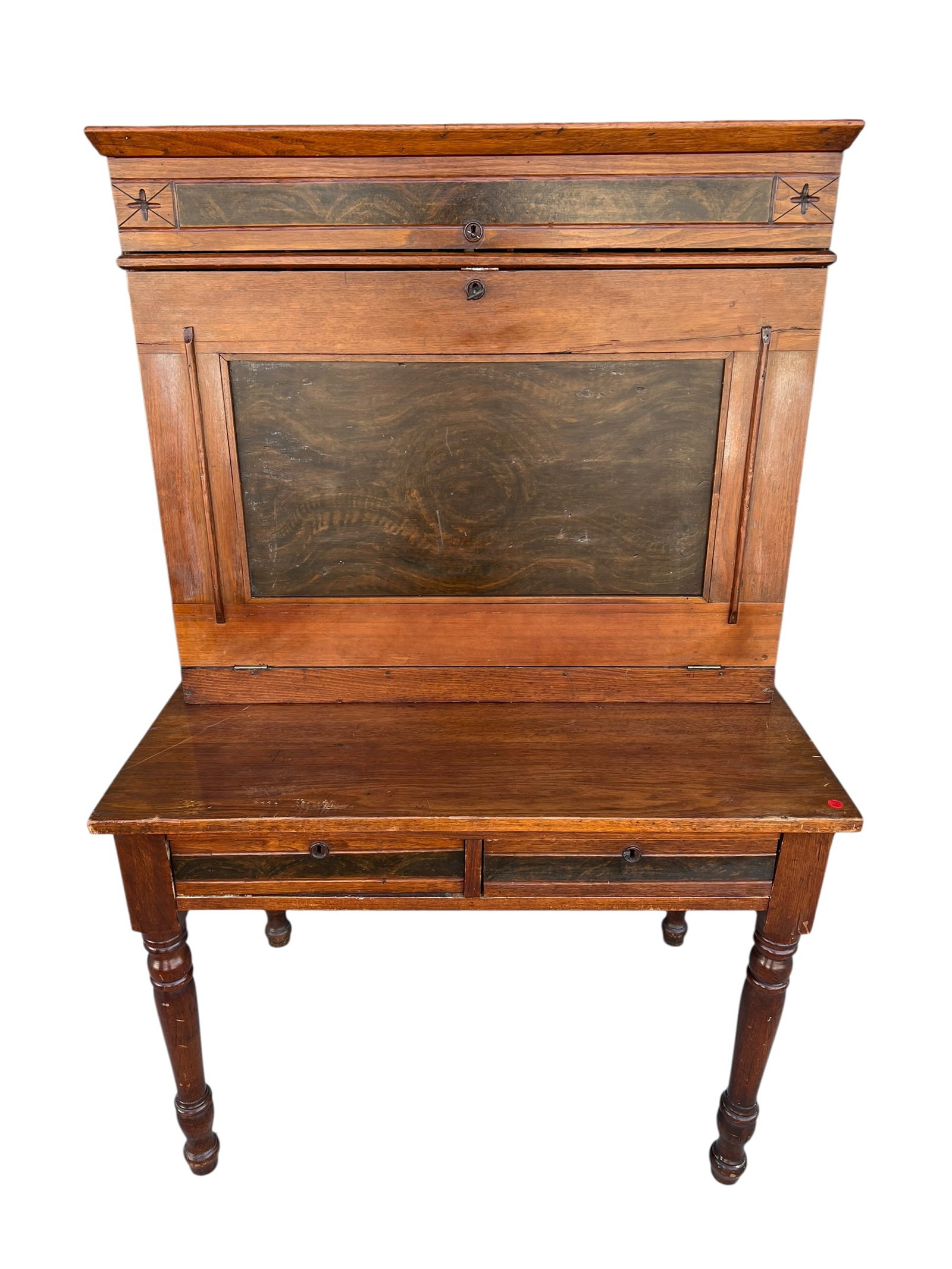 Antique Oak Drop-Front Secretary Desk with Pigeonholes & Turned Legs: Antique drop-front secretary / writing desk constructed in oak and other woods, featuring an upright cabinet section above a spacious writing surface. The upper front displays decorative dark figured 