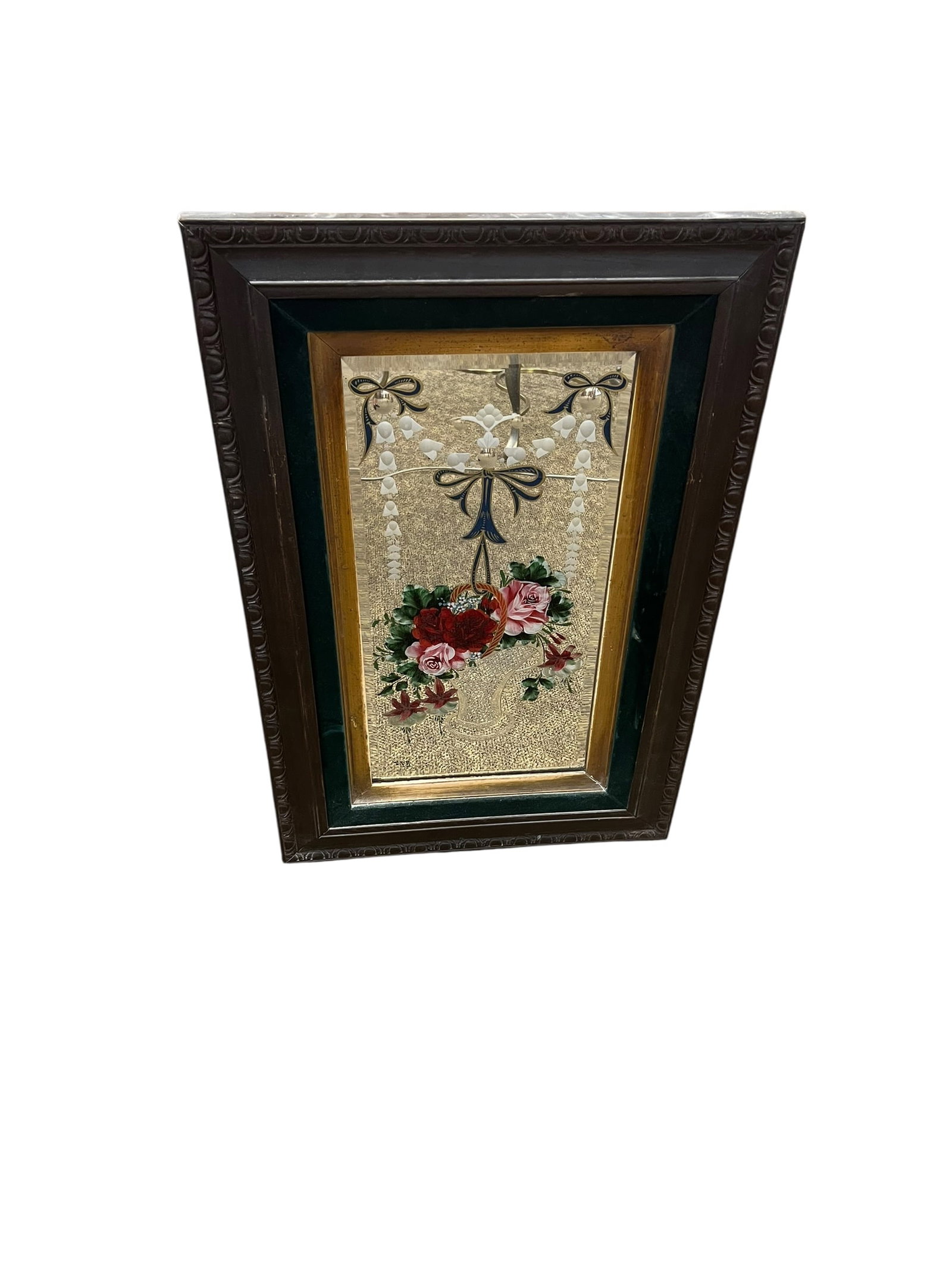 Reverse-Painted Floral Basket Mirror in Ornate Wood Frame: decorative reverse-painted mirror featuring a colorful floral basket motif with red and pink roses, greenery, and additional blossoms. The upper portion is decorated with graceful blue and gold ribbon