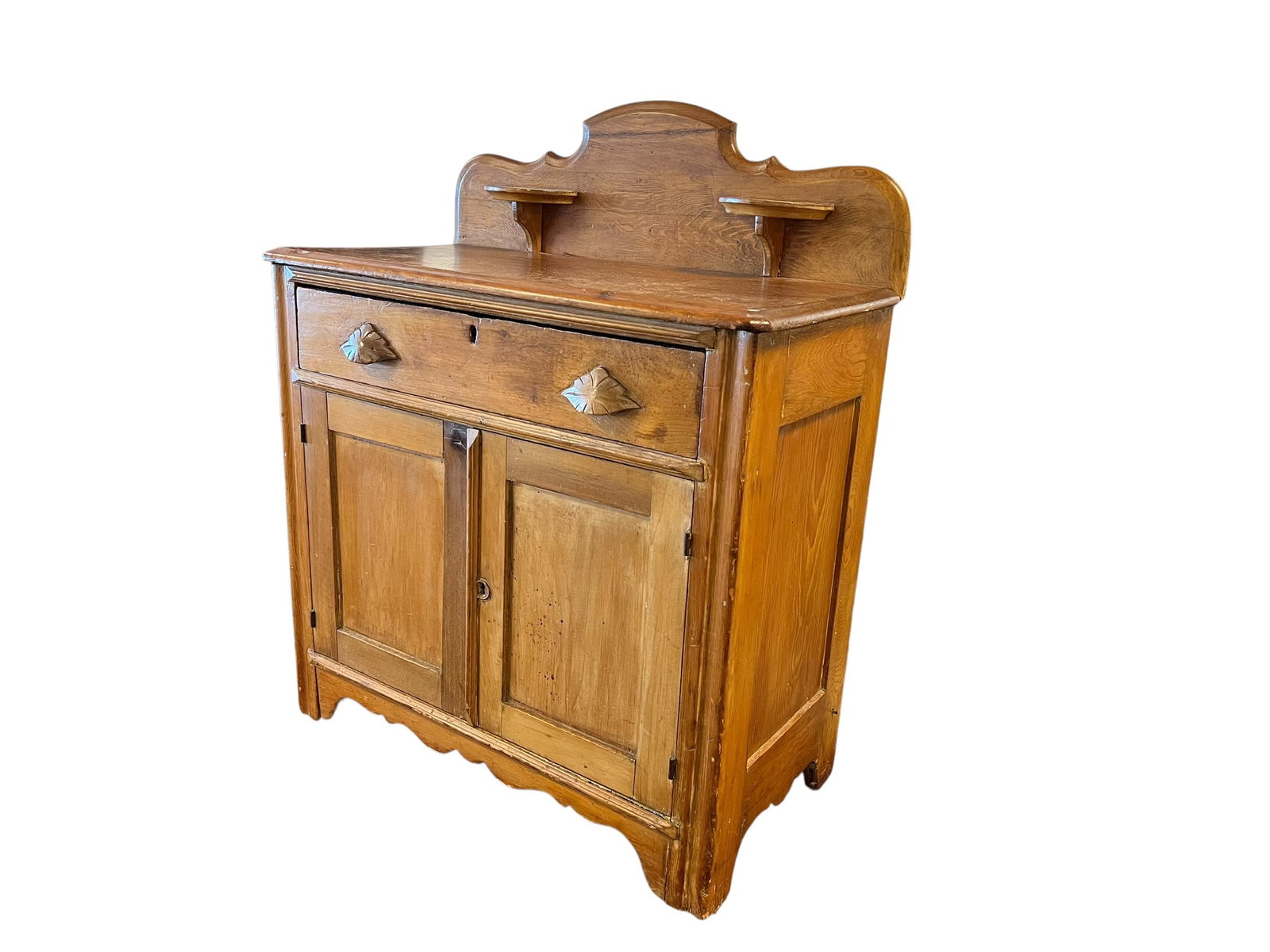 Antique Country Oak Washstand with Gallery Back & Leaf Pulls: Charming antique country washstand or dry sink cabinet constructed in oak and mixed secondary woods, retaining a warm aged finish and considerable period character. Features a shaped gallery backsplas
