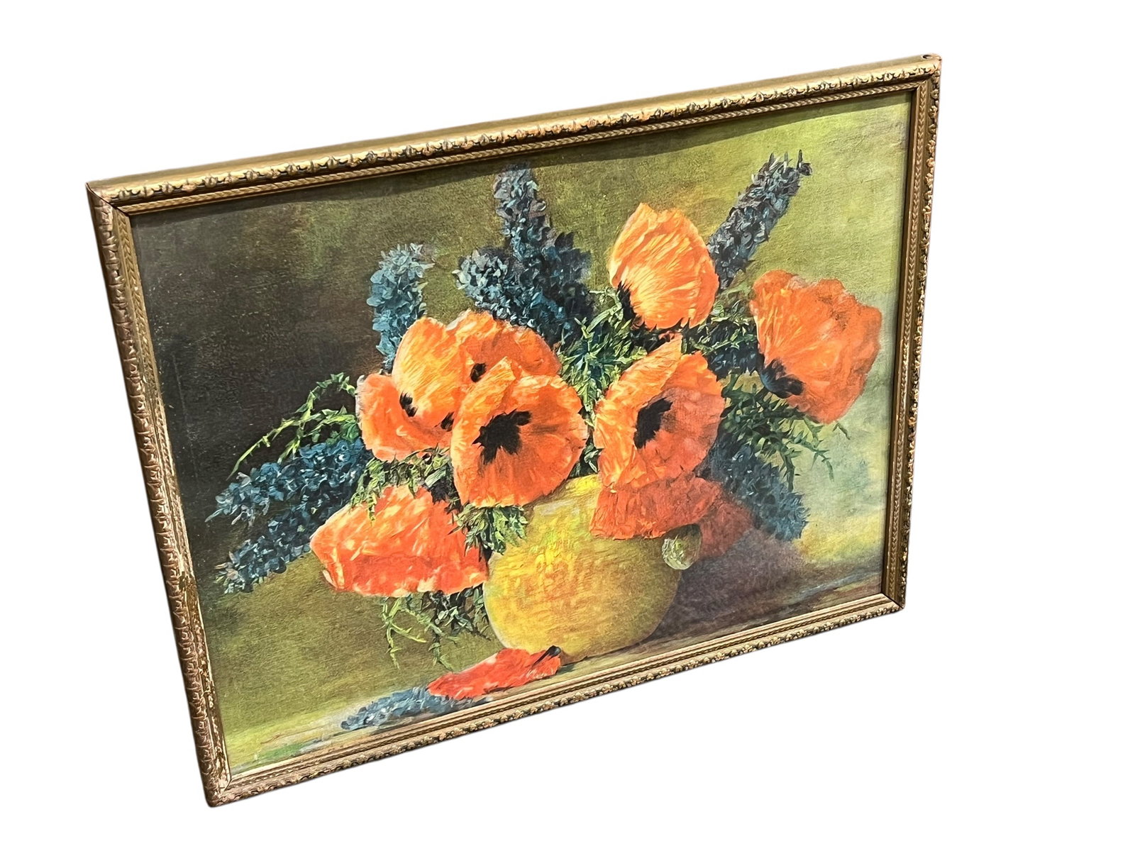 Vintage Framed Floral Still Life with Poppies & Blue Flowers: Decorative vintage floral still life depicting a lush arrangement of vivid orange-red poppies accented by tall blue flowers and green foliage, arranged in a rounded yellow-gold vase. The dramatic blos