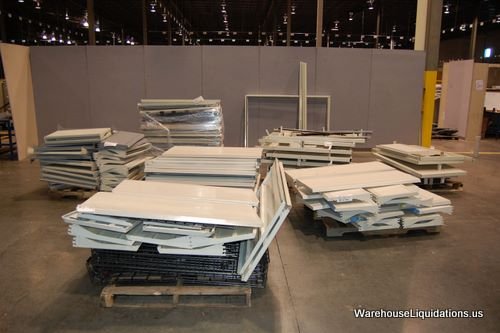 Assorted Uprights Shelving and Islander: Set of Assorted Shelves and Uprights on 7 Pallets. 51 16" Shelves 20 22" Shelves 37 14" Shelves 9 30 1/2" x 51" Uprights 1 49" x 31" Islander 7 36" x 48" Wire Shelving Units 6 Wire Sign Holders Total 