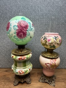 Two antique kerosene hurricane lamps
