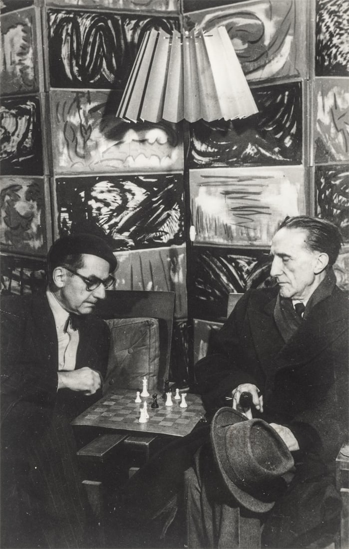 Man Ray. Man Ray and Marcel Duchamp playing chess in Man Ray's studio on Rue Férou, Paris. 1952: Man Ray (Philadelphia 1890 – 1976 Paris). Man Ray and Marcel Duchamp playing chess in Man Ray's studio on Rue Férou, Paris. 1952/1960 Vintage. Gelatin silver print. 23,2 × 15