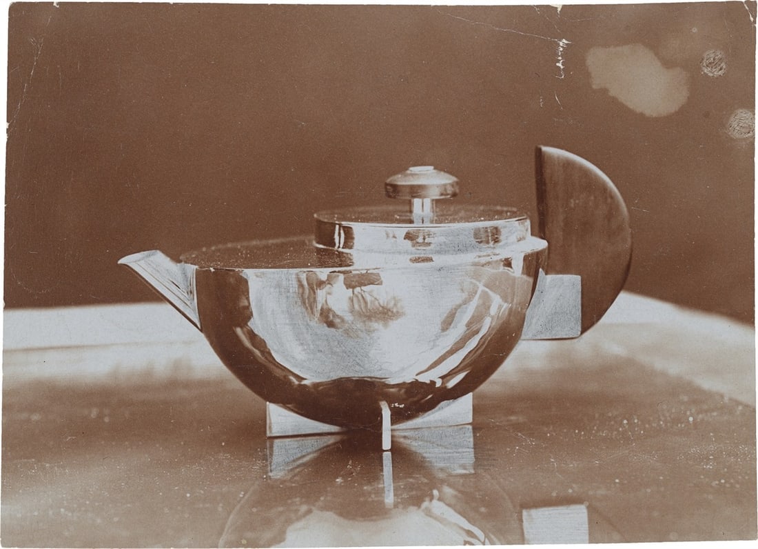 Marianne Brandt. Teapot for tea-extract (MT 49), design by Marianne Brandt (1924). Circa 1924: Marianne Brandt (Chemnitz 1893 – 1983 Kirchberg). Teapot for tea-extract (MT 49), design by Marianne Brandt (1924). Circa 1924 Vintage. Gelatin silver print. 8,8 × 12 cm
