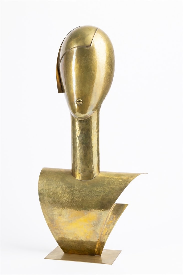 Franz Hagenauer (workshop). Head of a woman. 1970s: Franz Hagenauer (workshop) (Vienna 1906 – 1986 Salzburg). Head of a woman. 1970s Brass, embossed, on a square brass base plate. Height: 75 cm (29 ½ in.). Stamped on the
