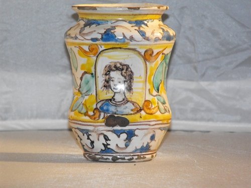 SMALL MAJOLICA ALBARELLO,BURGIO 18th. C.: Rare small majolica albarello, painted with female figure,Burgio 18th. century. Size:h.14x10 cm.(5.52"x3.94")