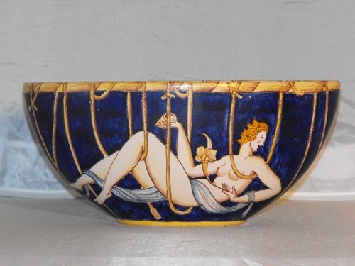 CUP OVAL GIO PONTI, MANUFACTURING GINORI,: Cup oval Gio Ponti, manufacturing Richard Ginori,1923-1926, series "Le mie Donne" (my women)in ceramic with yellow edged lower and upper,with central female figure,braided rope around the entire perim