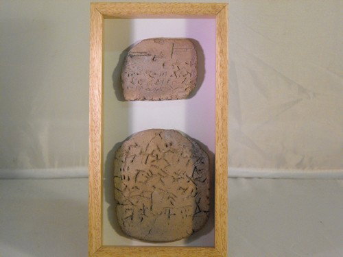 CONTEPORARY CUNEIFORM TABLETS.: Contemporary cuneiform tablets,in glass case. Size: case 22x12 cm. (8.67"x4.73")